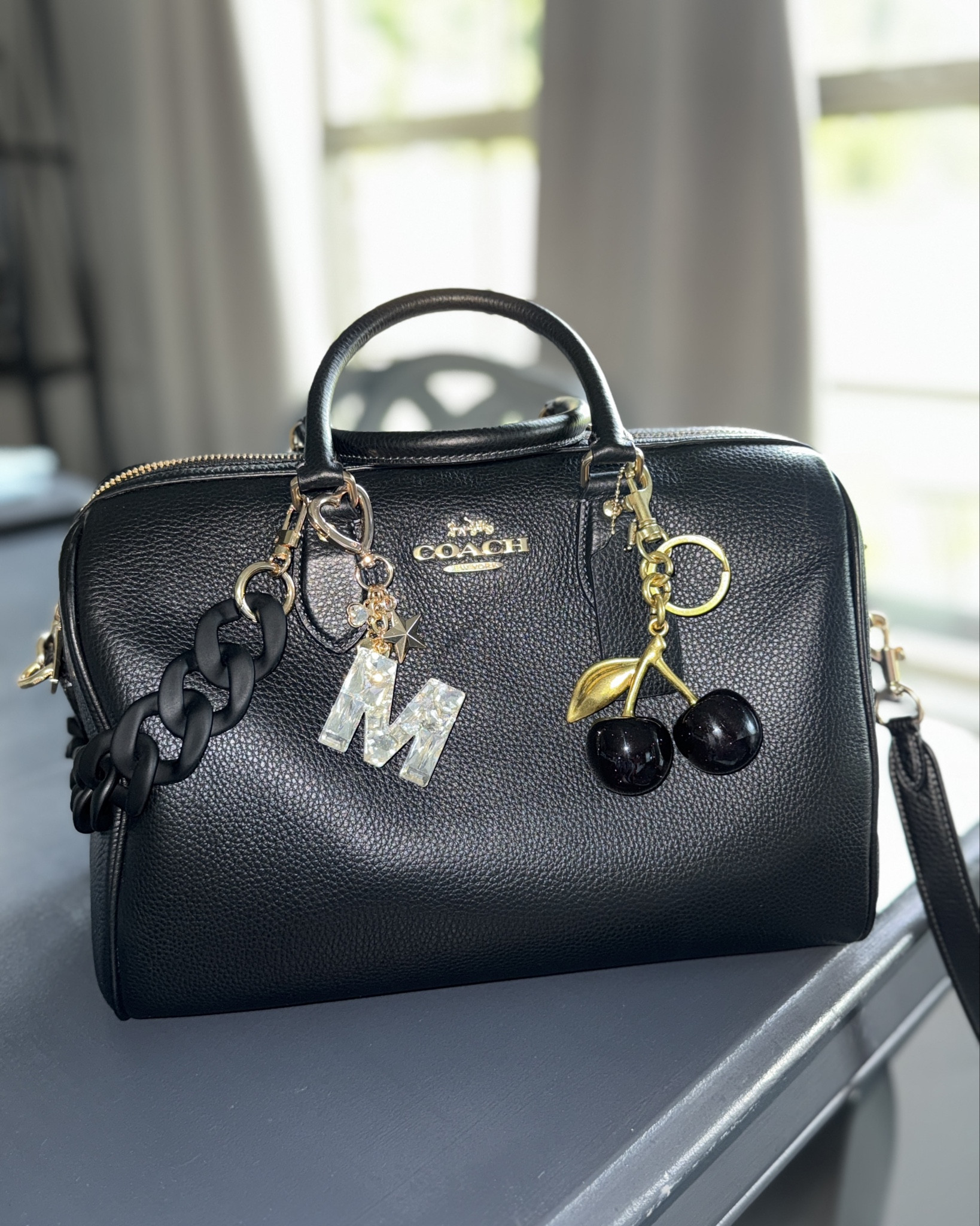 Black bag supremacy 🖤✨
Classic, structured, and elevated with a little personality. I love adding charms and a twilly to make a timeless bag feel custom and luxe.

This one transitions from work to brunch to date night effortlessly — she’s THAT girl. Linked for you 💼🍒✨

#LTKItBag #LTKStyleTip #BagCharmTrend #CoachStyle #BlackHandbag #StatementAccessories #ElevatedEveryday #CorporateChic #LuxuryOnABudget #EverydayLuxury #LTKFinds #WomenInStyle #PolishedLook #StyleInfluencer #ShopMyLook

#LTKWorkwear #LTKmomlife #LTKootd