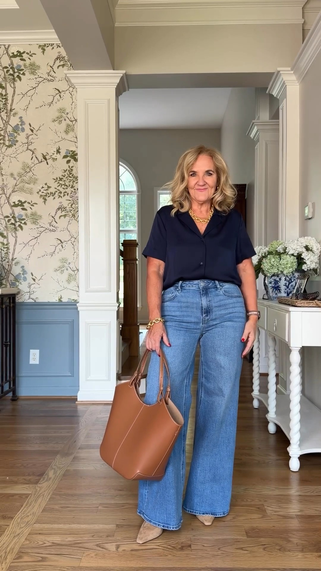 Tap the bell 🔔, heart ❤ this post, and save for later!

These wide leg jeans are a flattering wardrobe staple with the perfect relaxed fit. Paired with a classic navy blouse, this is an effortless outfit you'll reach for on repeat from late summer into fall.

Fit note: I'm wearing a size 29 on the jeans, and medium on the top

They're an easy choice for travel days, lunch with friends, or any time you want a polished outfit that still feels comfortable. 

 #LTKootd #LTKgrwm #LTKOver40