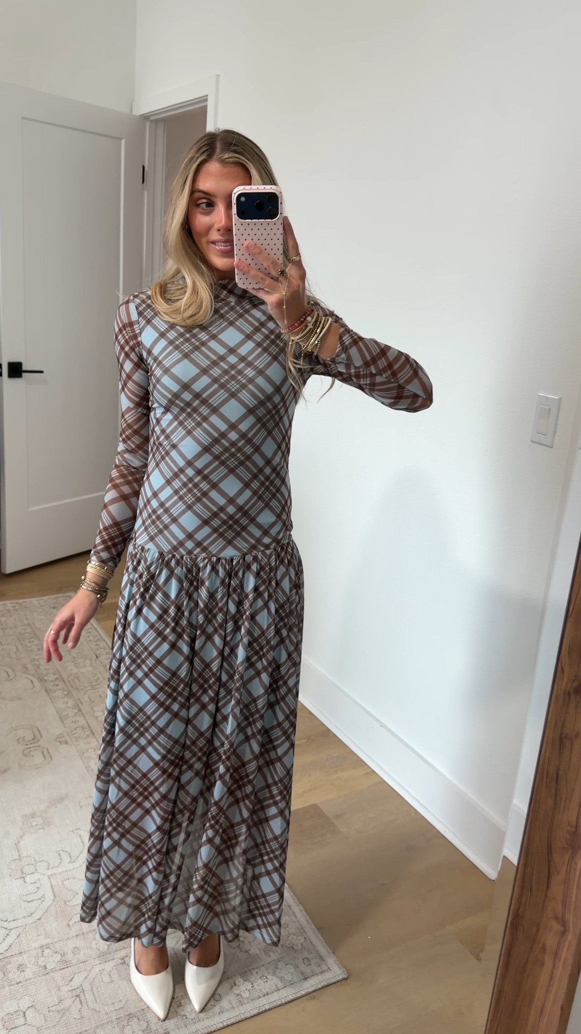 @Petal & Pup size xs 
The Odilia Long Sleeve Mesh Maxi Dress in Blue Plaid is the kind of piece that earns compliments without trying too hard. A refined mock neckline and a striking plaid print give this dress its fashion-forward edge, while the gathered drop-waist skirt adds a playful, feminine touch that moves beautifully with every step.