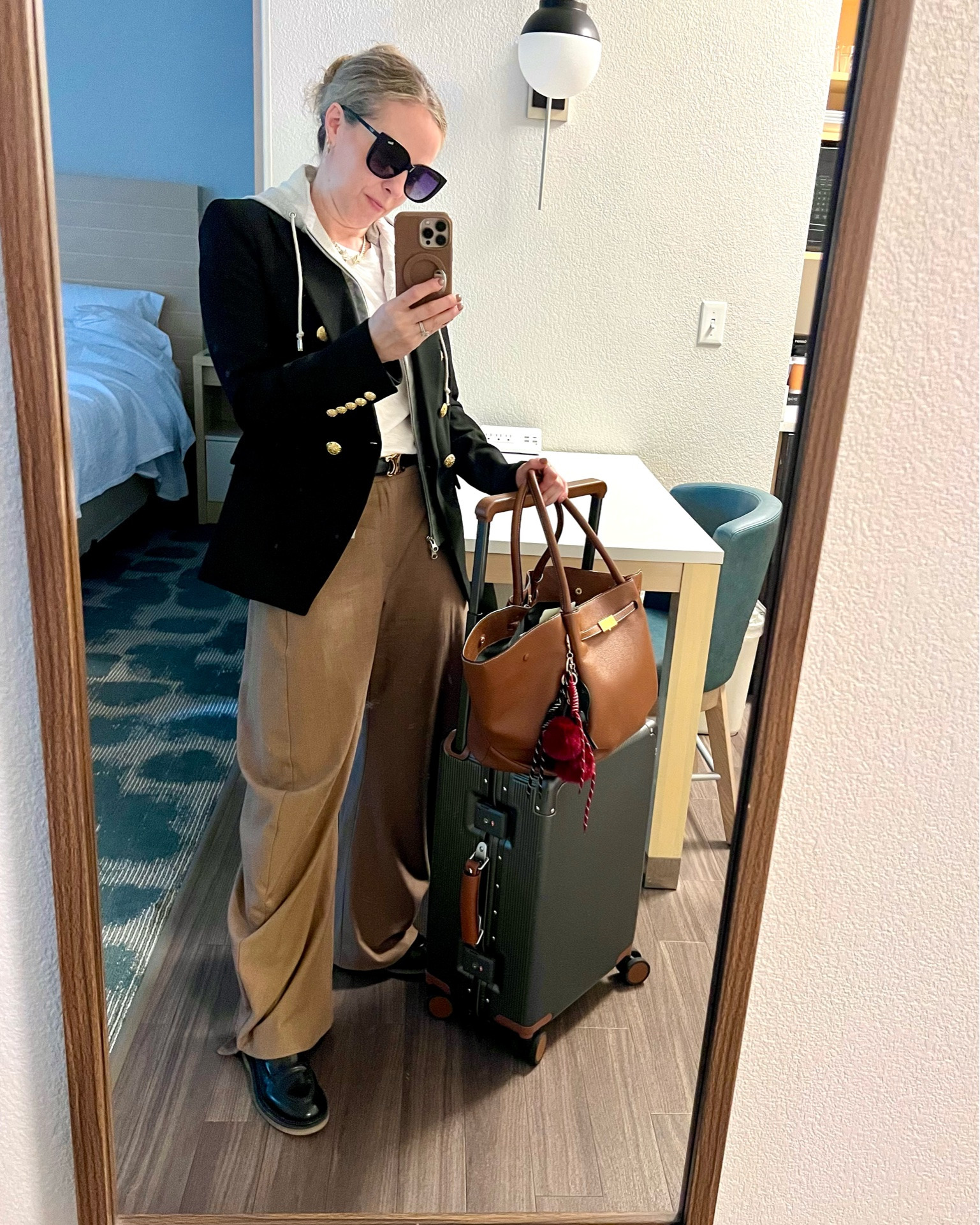 Travel workwear essentials

Perfect polarized sunnies
Veronica Beard blazer doesn’t wrinkle and has ton of zip-in choices to change the look
FP barrel trousers in a Jerri gnome material for some on-trend polish 
A work bag that fits everything
Lightweight carryon that looks great

#LTKOver40 #LTKWorkwear #LTKTravel