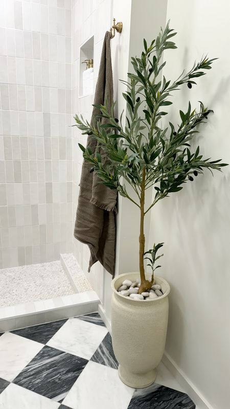 Perfect tree for small spaces. We added this beauty to our bathroom to give a serene oasis spa like feel 🤍

#olivetree #bathroomroom #planter

#LTKxTarget #LTKfindsunder100 #LTKhome