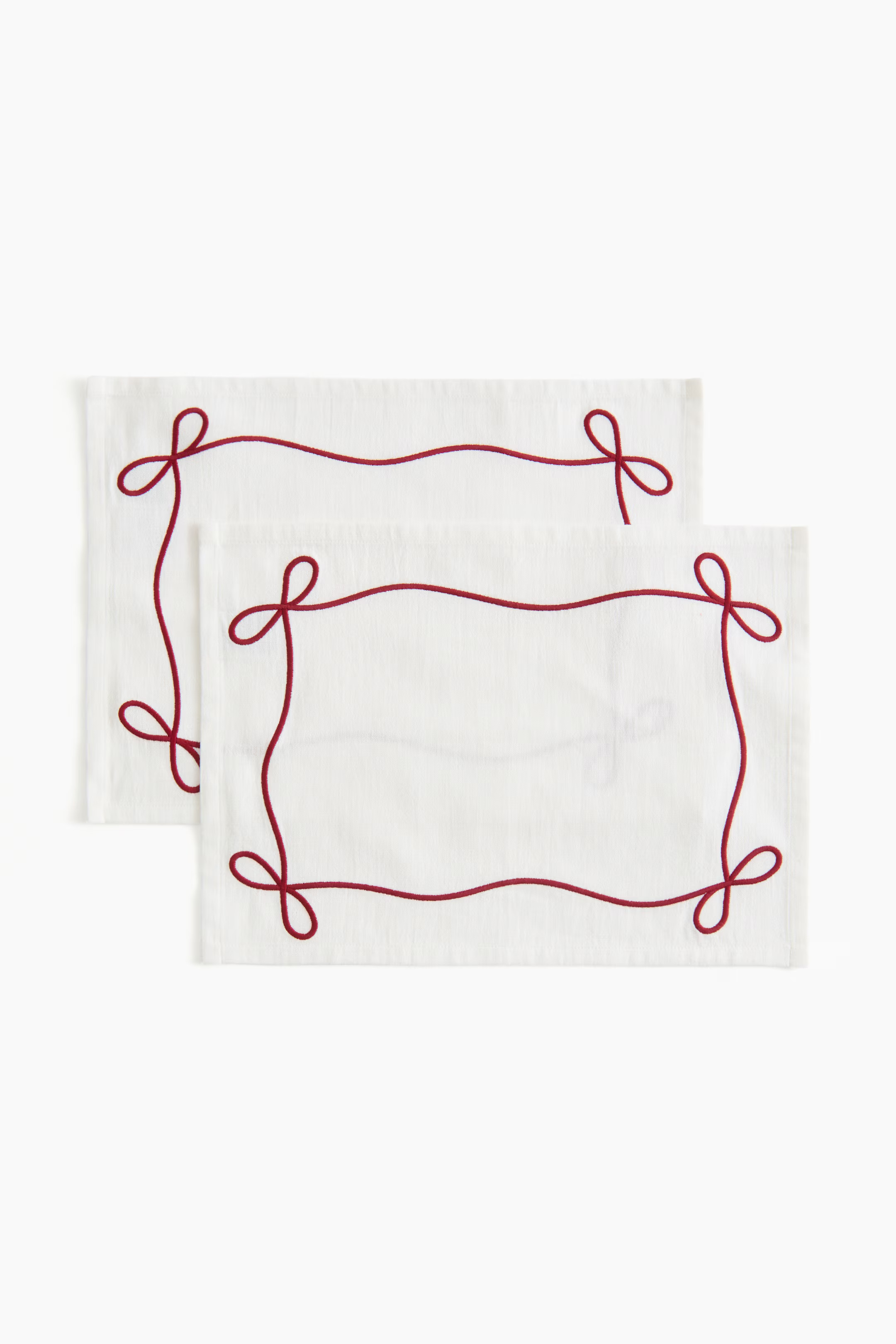 2-pack embroidered linen-blend placemats | H&M (US + CA)