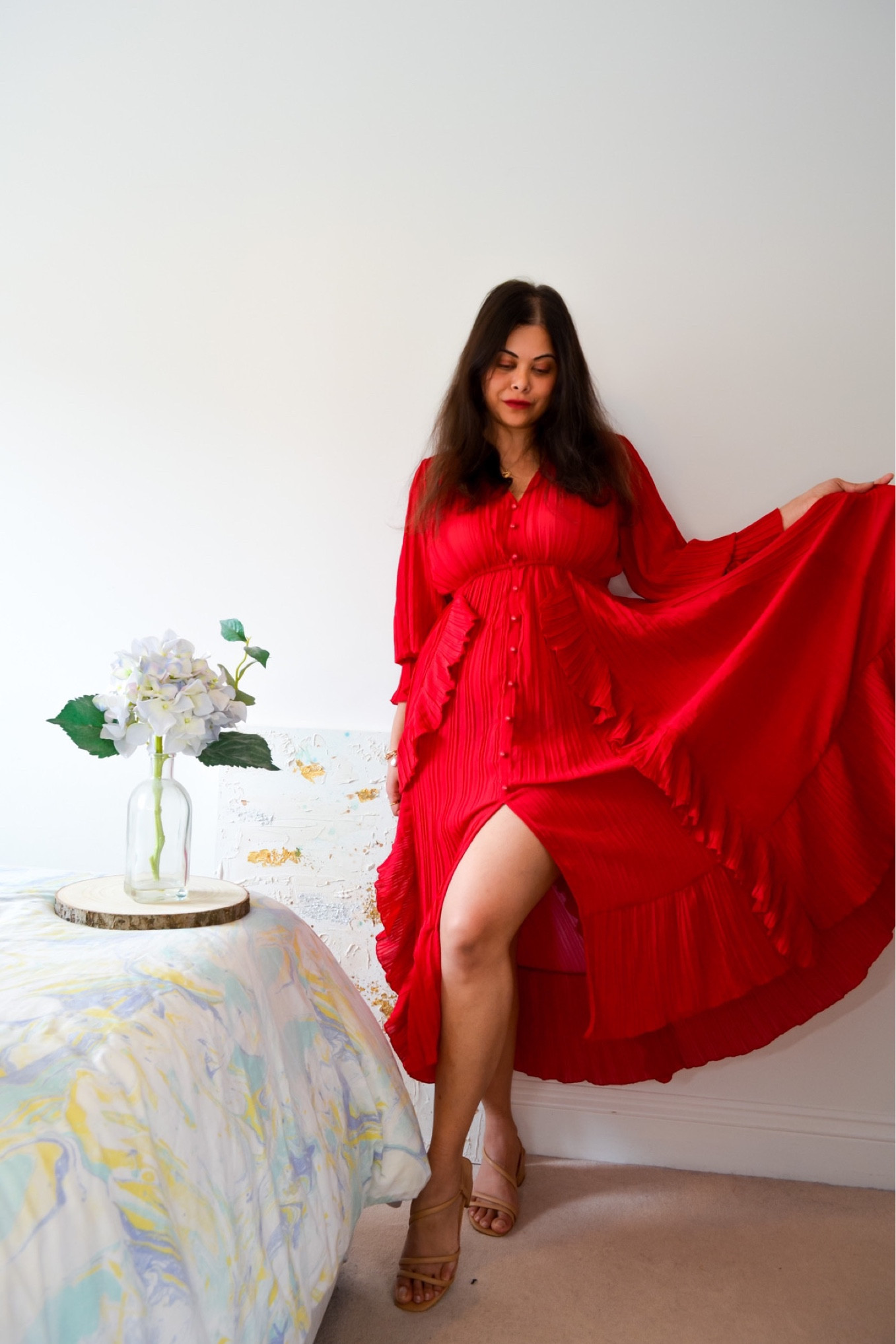 For the trend-lover looking to make a seasonal statement, our pleated chiffon midi dress was made for you. Crafted with a chiffon fabric finished that cinches at the waist, this elegant dress features buttons and ruffle trimming with a long-flowing silhouette and an asymmetrical slit hemline, perfect to show off your legs. Take this frock out for a dance floor and enjoy all eyes on you! #chiffondress #vacationdress #reddress

#LTKU #LTKFind #LTKeurope