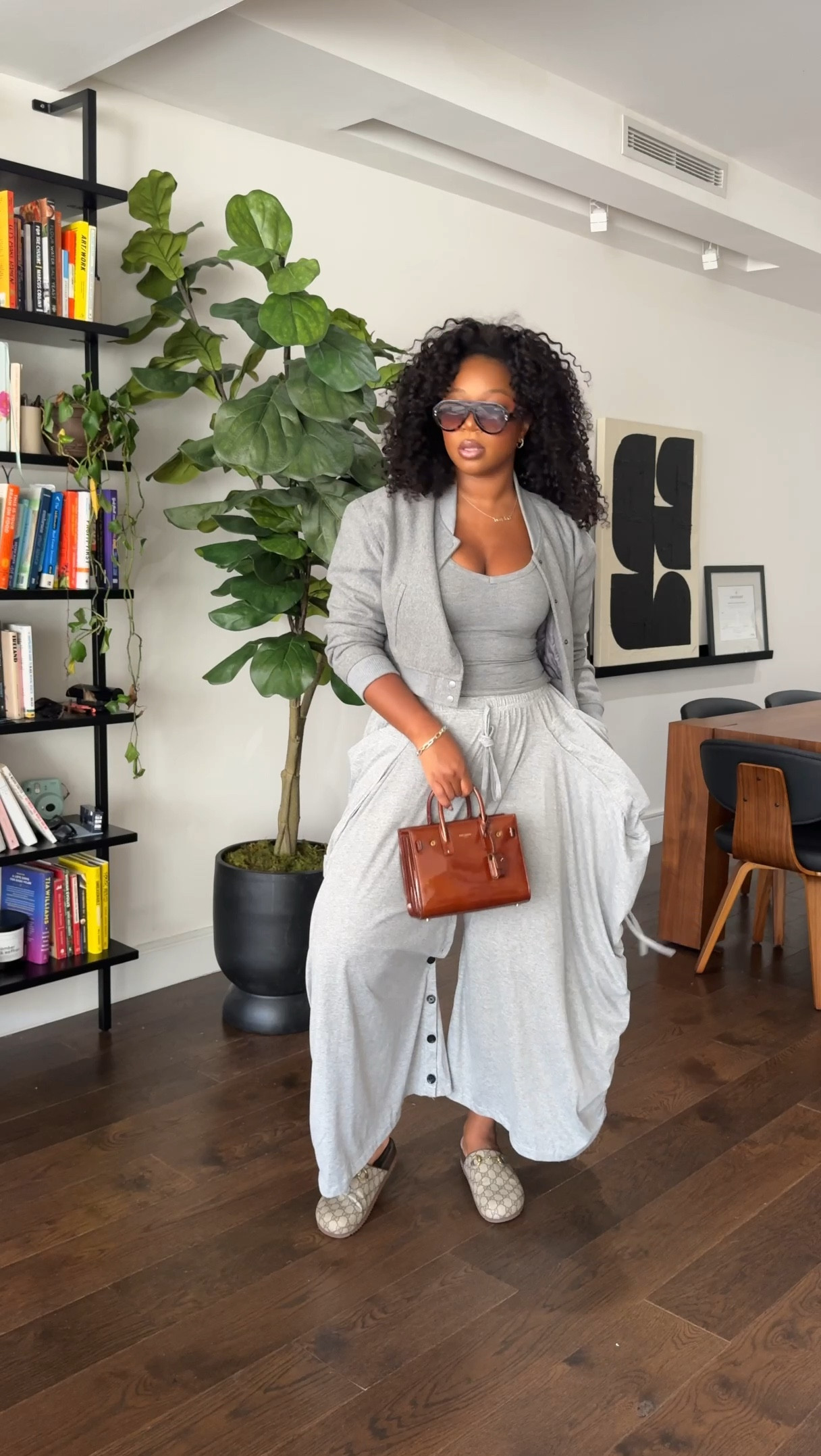 love this all gray moment!! i am 5'9 200 lbs wearing a medium jacket- can also do large! 

a small in the tank top and the pants are one size fits most. 

I've added some bags and shoes to pair with as well!


#LTKStyleTip #LTKMidsize #LTKFindsUnder100