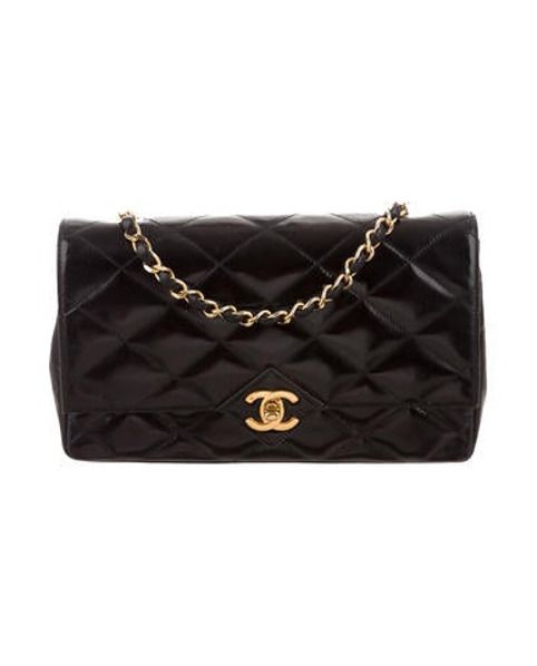 Chanel Vintage Diamond Quilted Flap Bag Black | The RealReal