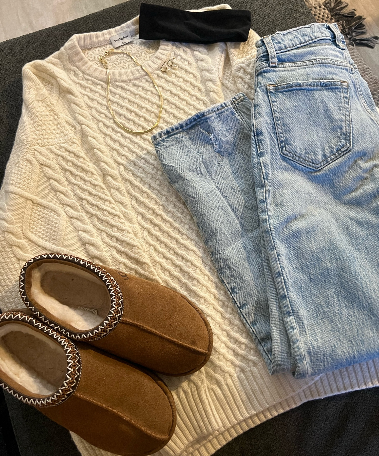 Neutral Winter Cable Knit Cream Sweater with Blue Jeans and Ugg Slippers with Gold Accessories and Black Headband

Not linked: Sunday Best Peggy Sweater


#LTKstyletip