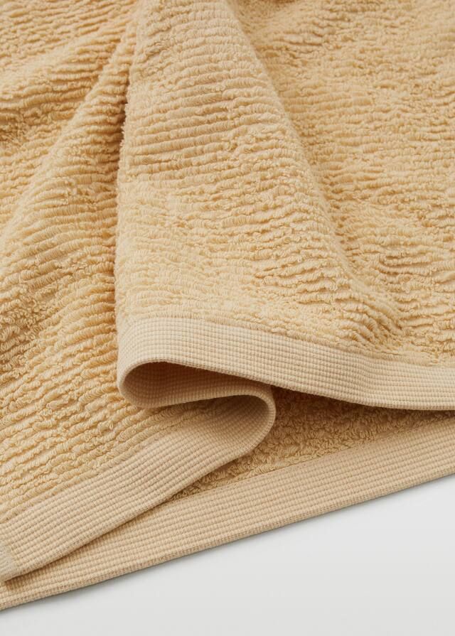 100% Organic cotton face towel | MANGO (UK)