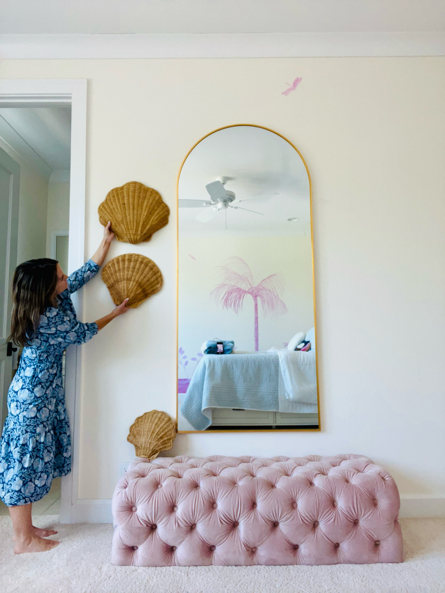 She hangs seashells...