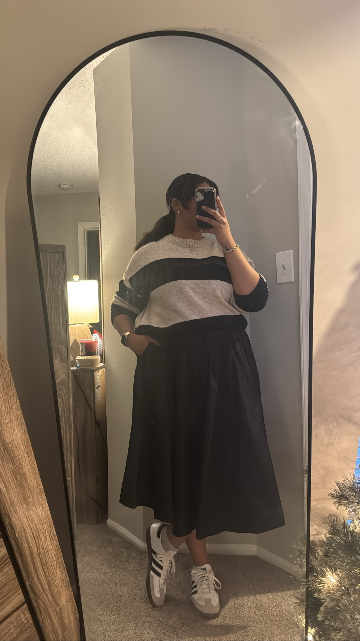 Workwear, but make it comfy! 💼✨ Pairing a cozy striped sweater with a flowy midi skirt and classic Adidas sneakers for the perfect mix of casual and chic. Shop the look on LTK! 🖤 #LTKworkwear #comfychic #stripesandskirts

#LTKWorkwear #LTKSeasonal #LTKFindsUnder50