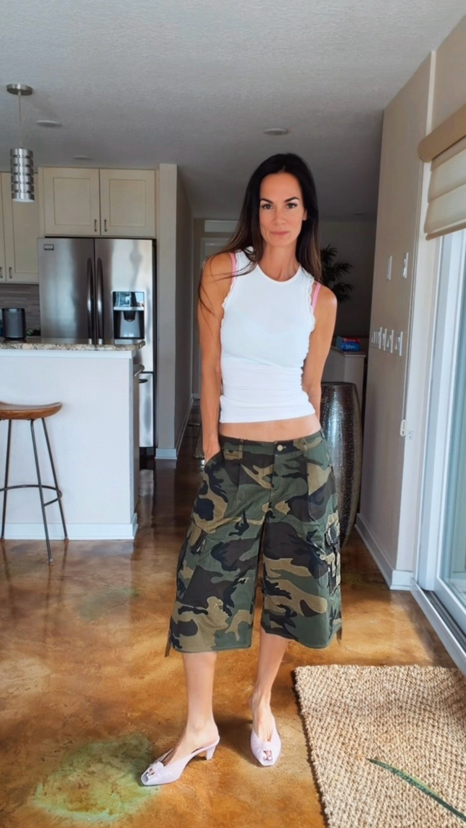 Camo, but make it flirty. 🎀

These oversized camo Bermudas paired with the sweetest ribbed tank and its little lace trim? An unexpectedly perfect combination. And yes—that pop of pink is part of the most gorgeous matching lingerie set underneath. 💕

Finished with my pink Chloé shoes, Balenciaga bag and Khaite x Oliver Peoples sunnies because apparently camo can be very high maintenance. 😂

Would you wear this mix?

#OOTD #CamoStyle #BermudaShorts #StreetStyle #DesignerStyle #HighLowStyle #OutfitInspiration #Over40Style #Over50Style #NicoleColee

#LTKootd #LTKgrwm #LTKdayinmylife