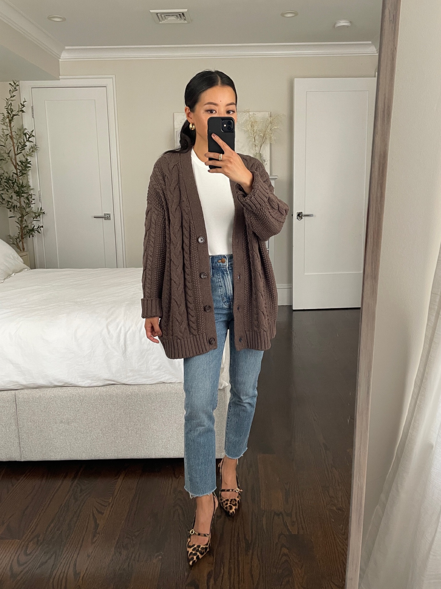 Oversized 100% organic cotton cable cardigan. Trying on size XS

This one definitely fits on the looser and wider cut side, and is big on petites with a thicker cable texture. 

I find their oversized pocket cardigan to be a better fit for petites, if you still want that oversized feel.

If you’re petite and love cable knit, I linked the shorter pullover style sweater too @onequince #quincepartner 

#LTKFindsUnder100 #LTKSeasonal