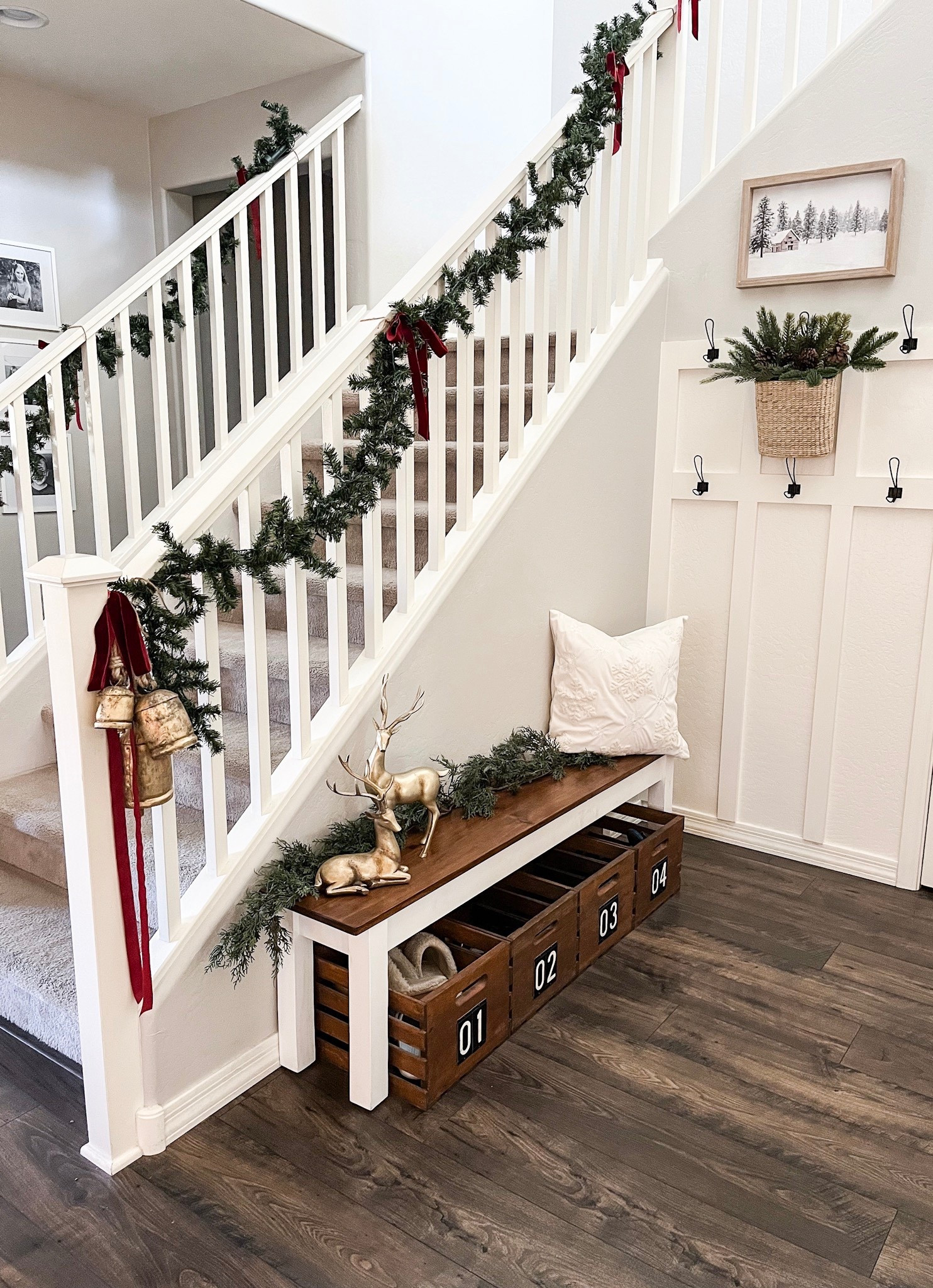 Simple garage entryway!  Follow @lifeinmyarizonahome on Instagram for more holiday ideas and inspiration. 

Festive gold deer, garlands, and bells give my garage entryway the perfect simple welcome!  Most of these pieces can easily transition to winter decor after Christmas. 

#christmasdecor #christmasentryway #winterdecor

#LTKHome #LTKSeasonal #LTKHoliday