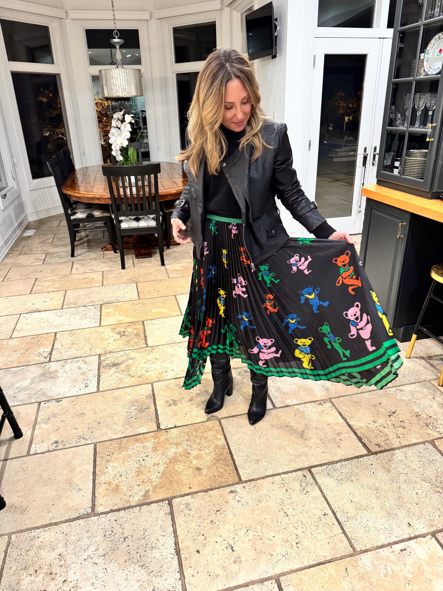 Literally, I am obsessed! I saw this skirt and as a long standing fan of the Grateful Dead, I feel like I finally found clothing that represents the dead and me at the same time. No hate on tie-dyes, but tie-dyes and patchouly were never totally my thing. This, this skirt with the dancing bears, hidden in the pleats. I am all about it. 

#LTKWorkwear #LTKSeasonal #LTKHoliday