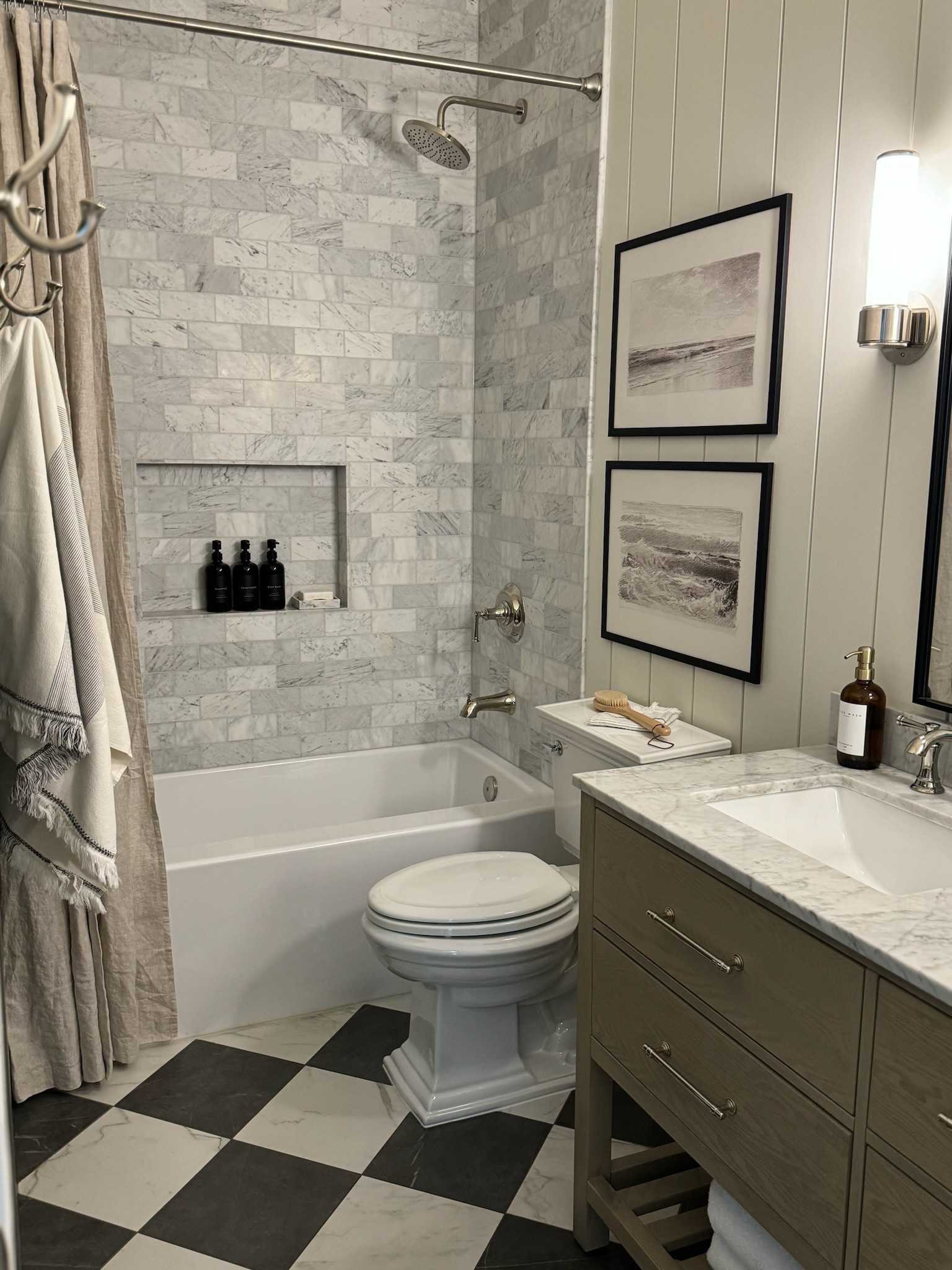 The guest bathroom reveal is here! #gifted I partnered with Signature Hardware to add these beautiful polished nickel plumbing features to the space to help refresh it and create a high end look and feel! Juxtaposed to our new marble tile from Wayfair this space feels to much more elevated and I love it! 

Signature Hardware Pieces: 
- Beasley Shower System 
- Beasley Sink Faucet 
- Provincetown Tub Spout 
- Moceri Doorknobs  

#LTKStyleTip #LTKHome