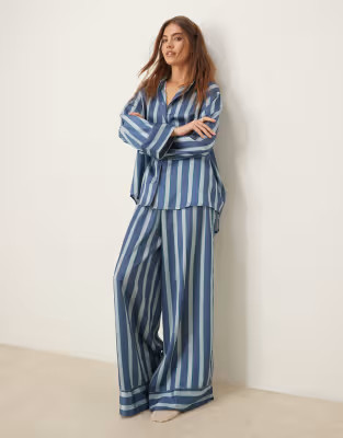 ASOS DESIGN oversized satin stripe shirt and pants pajama set in blue stripe | ASOS (Global)