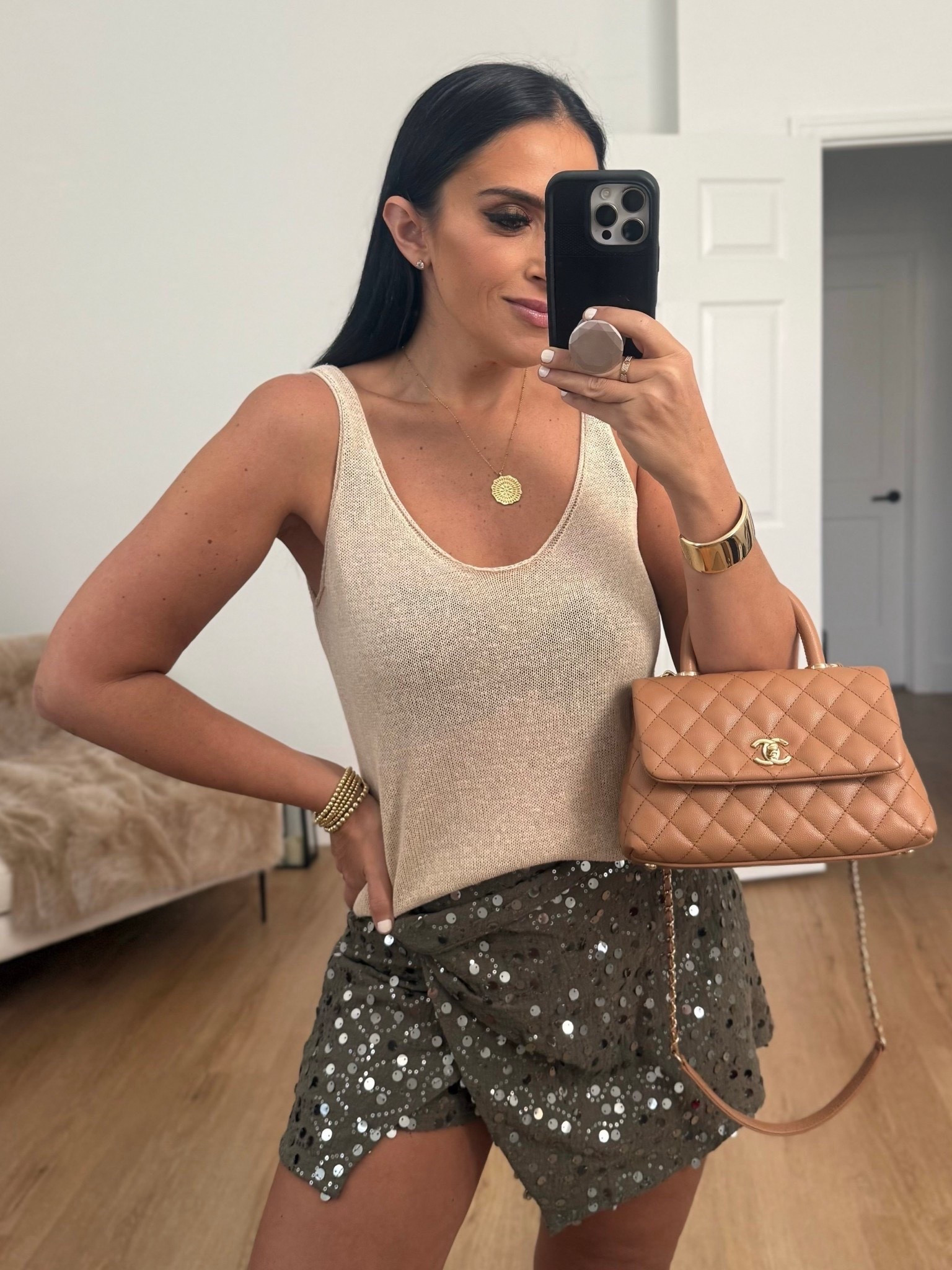 Sequin wrap mini skirt wearing size small. Linen knit top wearing size medium.

