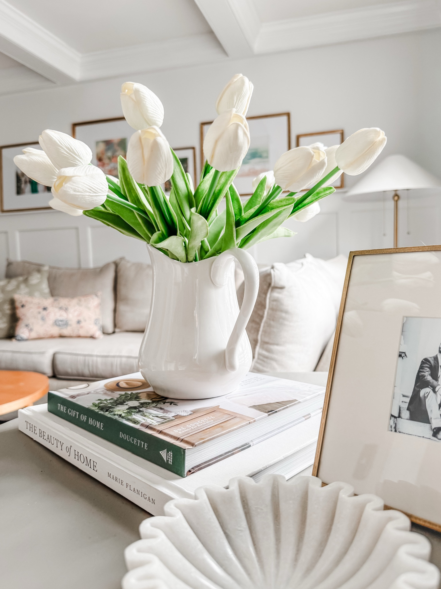 Artificial tulips
Spring florals
BEST Faux tulips 
Coffee table books
Marble ruffle bowl
Spring throw pillow
Gold floor lamp 

#LTKFindsUnder50 #LTKSeasonal #LTKHome