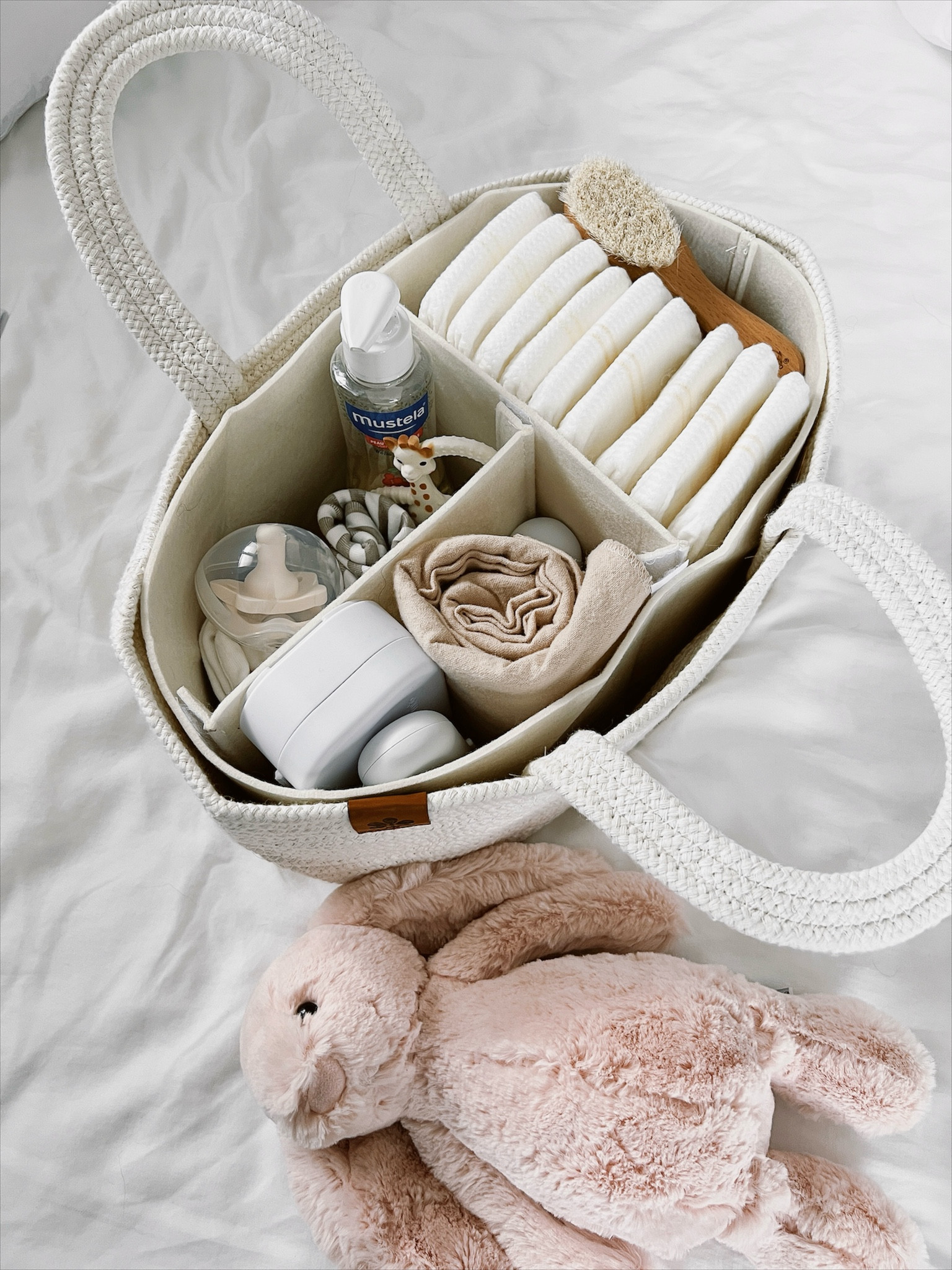 My diaper caddy essentials 

-@coterie diapers. Baby girl sleeps throughout the night with no leaks 
-hair brush 
-@fridababy 3-in-1 picker and nail trimmer 
-@mustlausa micellar water. I use it every night on her face to gently cleanse 
-Sophie the giraffe teething toy. It’s super lightweight and easy for her to hold 
-pacifier case from Amazon helps keep her paci clean 
-@burtsbeesbaby burp clothes 
-@tubbytodd all over ointment is the absolute best. It treated her dry skin, dry scalp and baby acne

Most items from @amazon 

#LTKfindsunder50 #LTKbaby #LTKsalealert