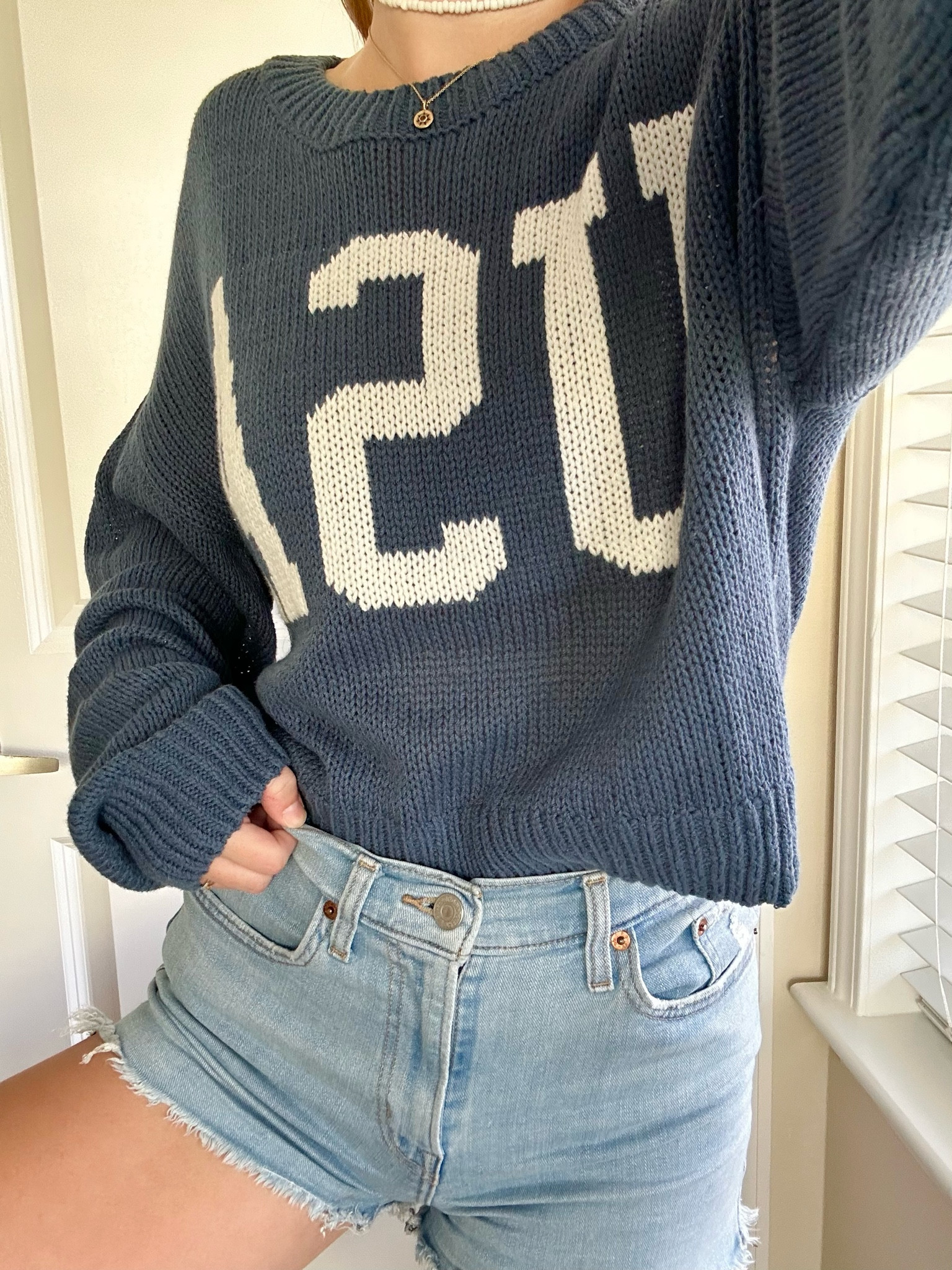 Fall in FL means a light sweater with jean shorts :) 
Sweater is Grayson Threads from Target - no longer available so I linked a similar option! 