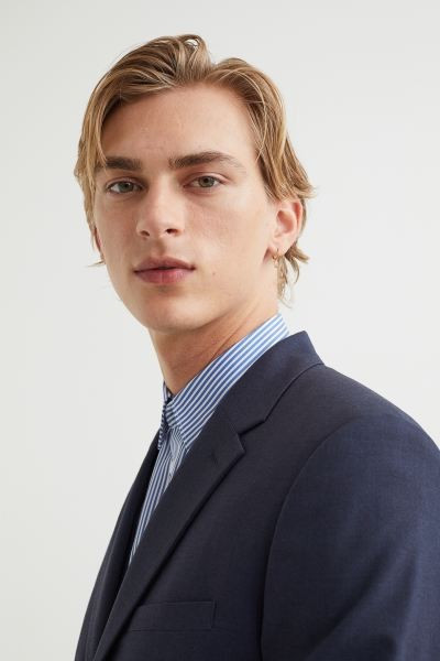 Conscious choice  Single-breasted blazer in woven stretch fabric with narrow, notched lapels. Che... | H&M (US + CA)