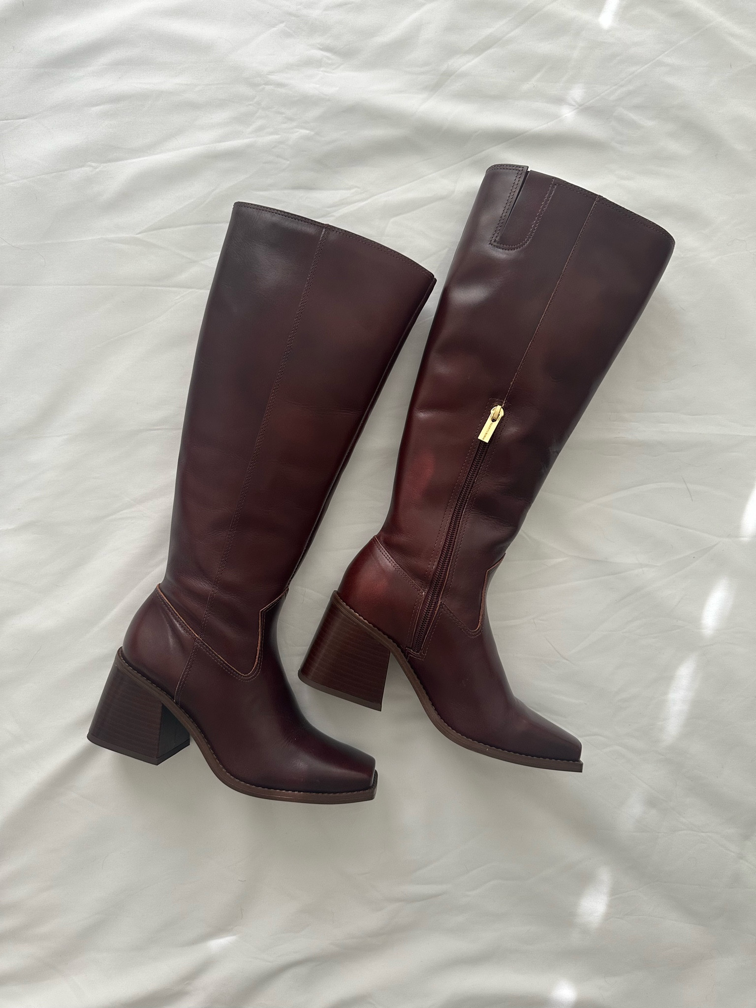 Favorite burgundy knee high boots 

#LTKHoliday #LTKSeasonal #LTKGiftGuide