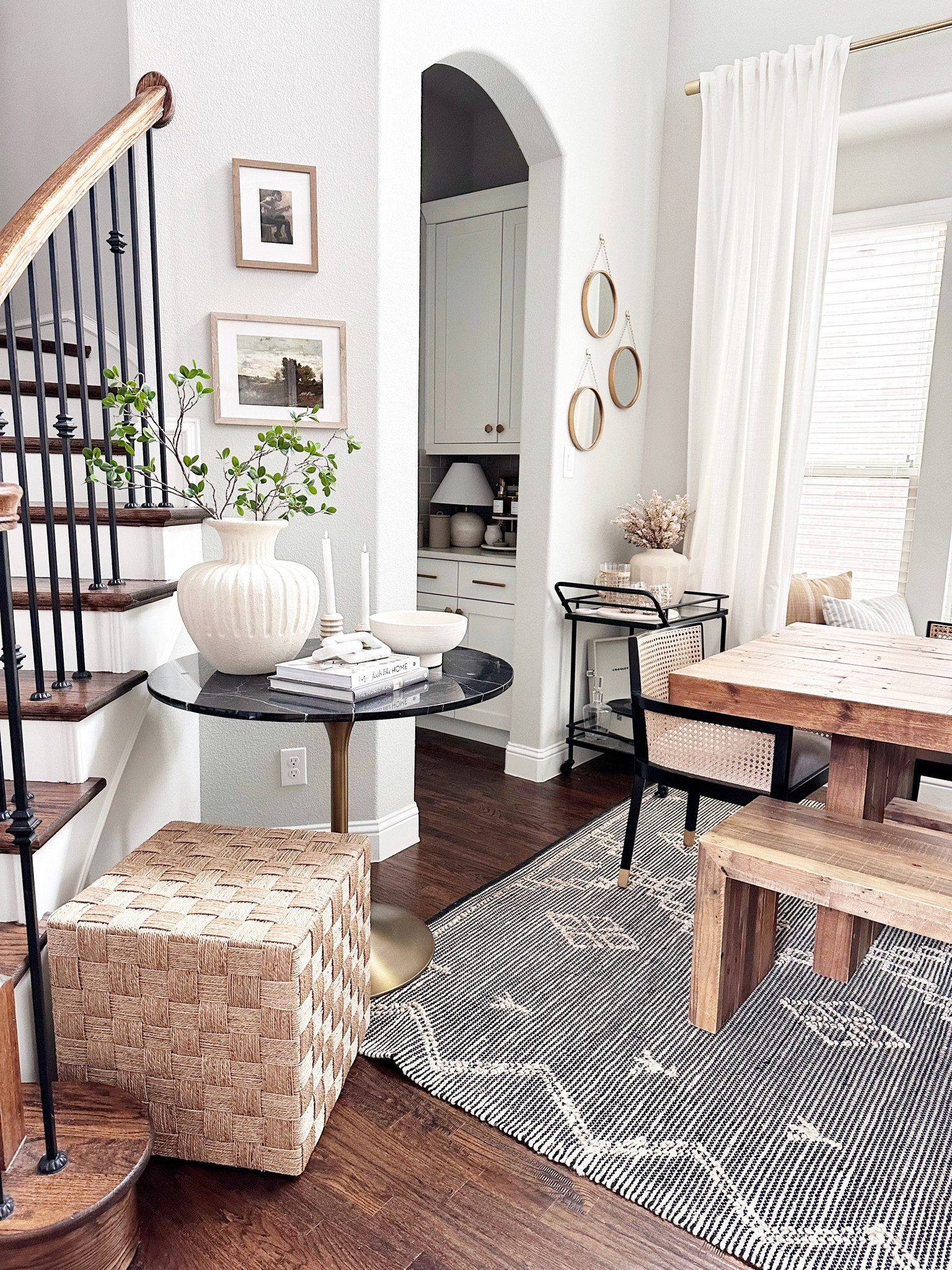 Dining room table with black cane chairs and black marble round table 

#LTKstyletip #LTKhome #LTKsalealert