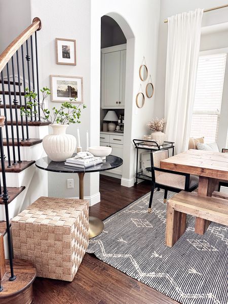 Dining room table with black cane chairs and black marble round table 

#LTKstyletip #LTKhome #LTKsalealert