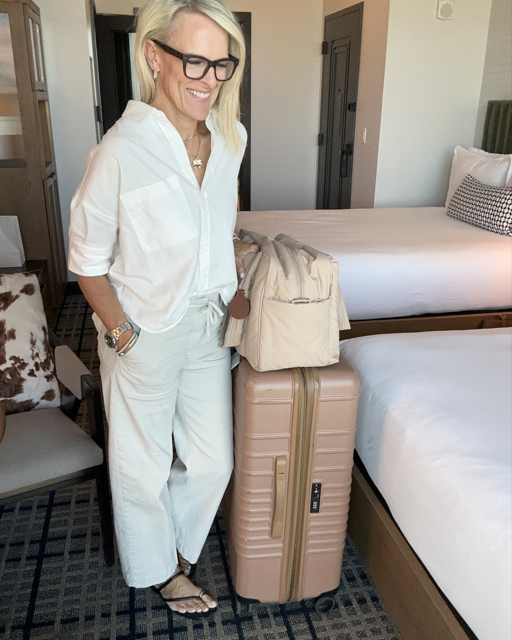 My favorite things that I never miss taking with me when I travel

My hanging makeup bag is size large 
Calpak carry on is not the large one 

Hanging makeup bag, body mist from salt and stone, Travel, jewelry bag with zippered pouches, favorite, carry-on bag, portable phone charger no extra cords needed

#LTKTravel #LTKFamily #LTKOver40