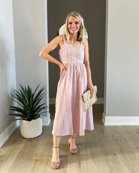 This pink midi dress is such a pretty spring dress! It would be perfect to wear to a graduation ceremony! I’m wearing an xsmall  

#LTKsalealert #LTKstyletip #LTKfindsunder50
