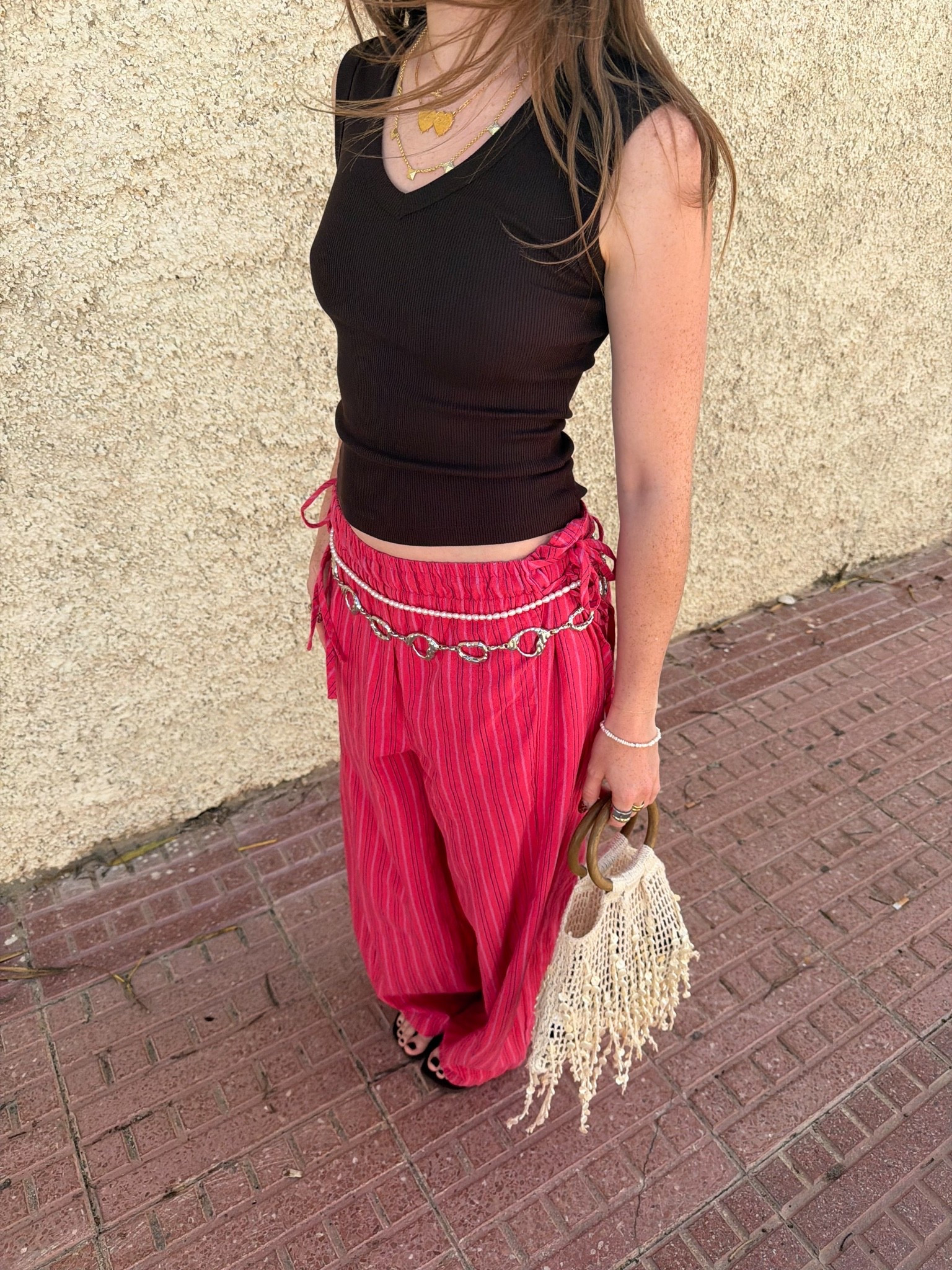 Summer outfit, holiday outfit, vacation outfit, free people, free people trousers, beaded bag, v neck vest

#LTKsummer #LTKeurope