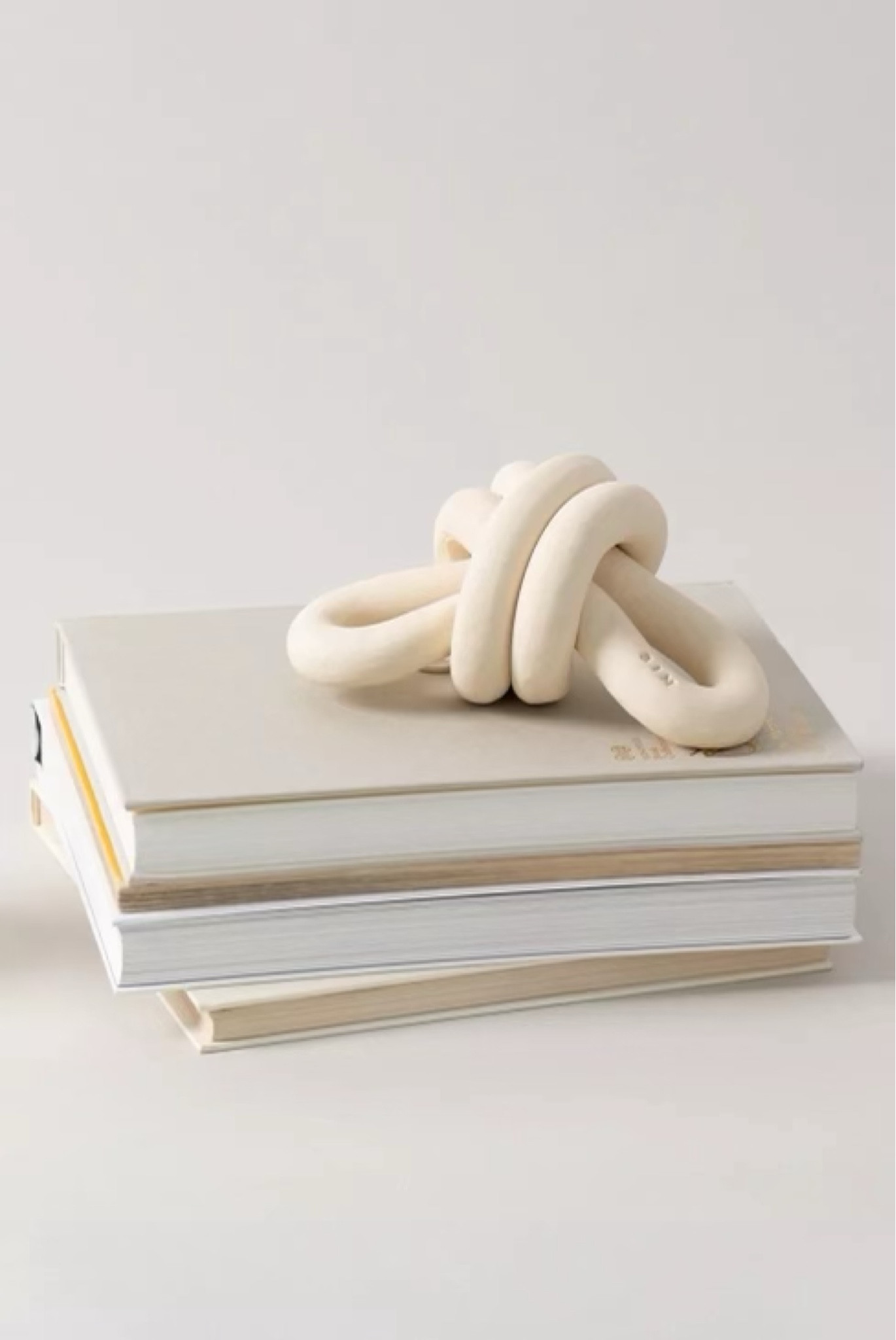 The SIN Collection from Urban Outfitters is ceramic material that looks like stoneware. This double knot accessory is great for coffee tables or shelf styling  

Coffee table accessories, stoneware, ceramic, home decor, table accessories, shelf decor

#LTKSale #LTKunder100 #LTKhome