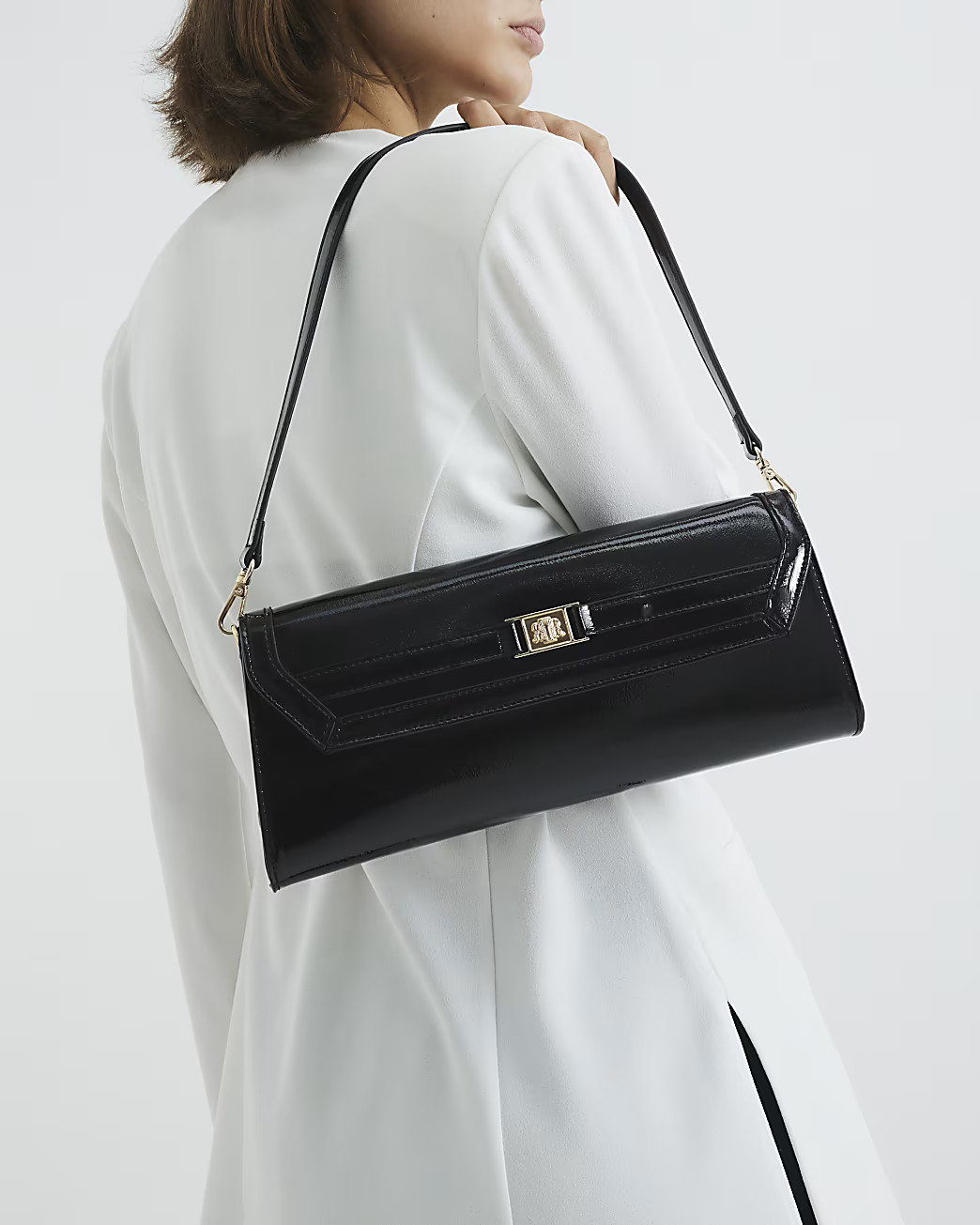 Black Faux Leather RI Clutch Bag | River Island UK & IE