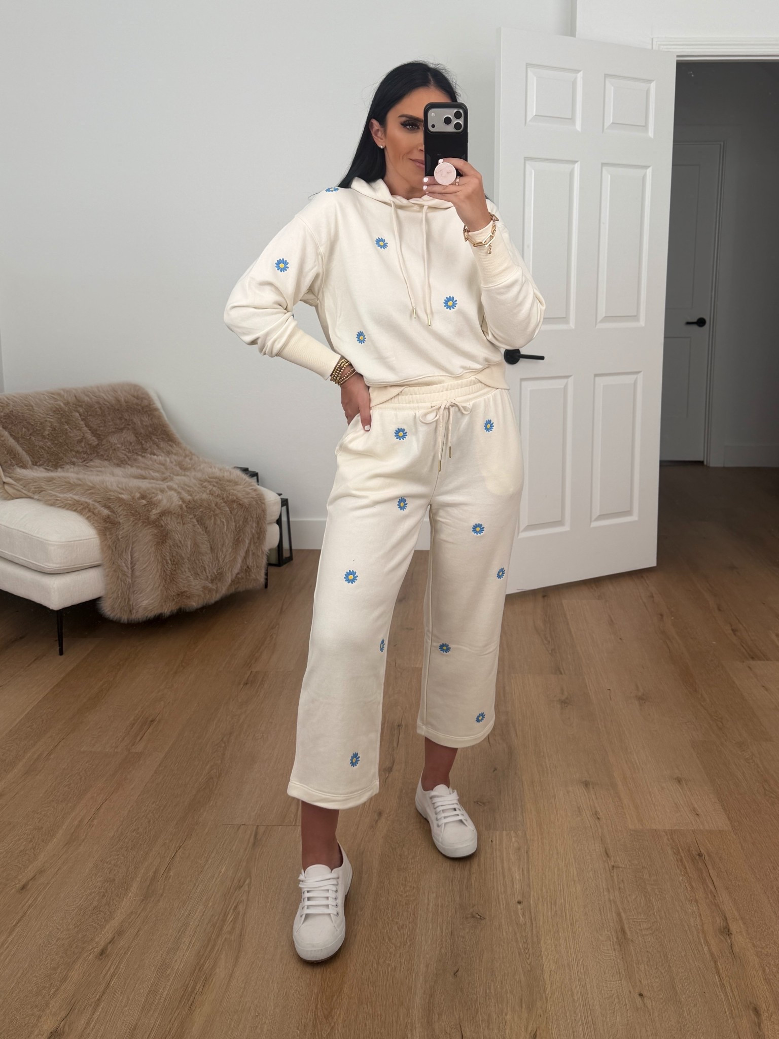 Women’s Cropped Embroidered Pullover Hoodie Sweatshirt wearing size small. Women's Embroidered Cropped Sweatpants wearing size small. 

