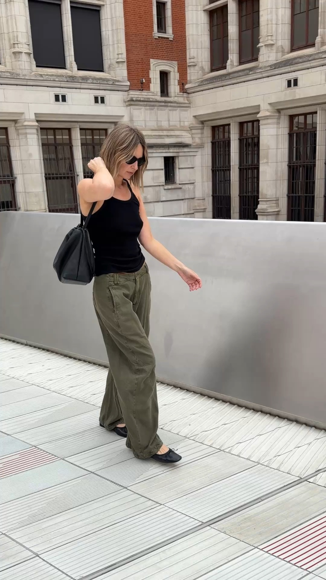 Zara black ribbed tank top, Zara cami top, Zara olive wide leg pants, Zara khaki barrel leg trousers, Zara cargo style pants, black leather flats, black slouchy shoulder bag, black sunglasses, get ready with me, outfit of the day, ootd video, styling video, city outfit, monochrome tonal outfit, effortless summer style, weekend uniform, quiet luxury, elevated basics, minimalist off duty look, ltkstyletip, ltkseasonal, ltksummer, ltkfindsunder100, outfit inspo, capsule wardrobe essentials

#LTKuk #LTKfestival #LTKeurope