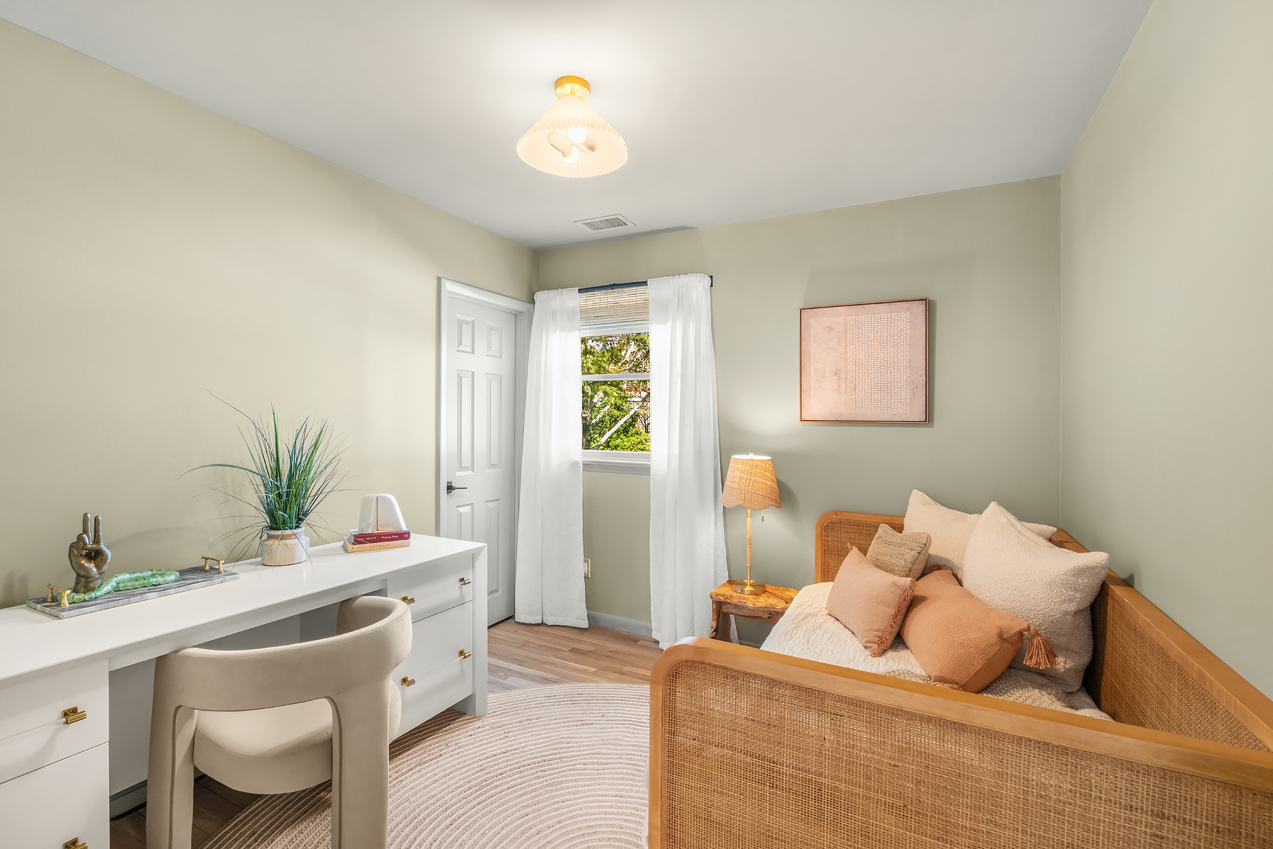 Green walls warm up this office, which doubles as a flexible sleeping space with a rattan daybed.

Linked exact and similar pieces below. 

 #LTKHome #LTKSaleAlert