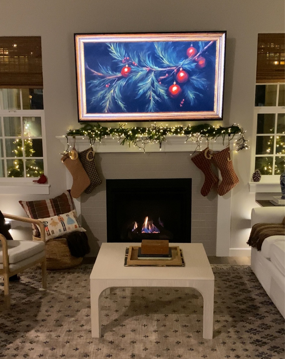 Living room Christmas decor on fireplace mantle 

#LTKHoliday #LTKHome