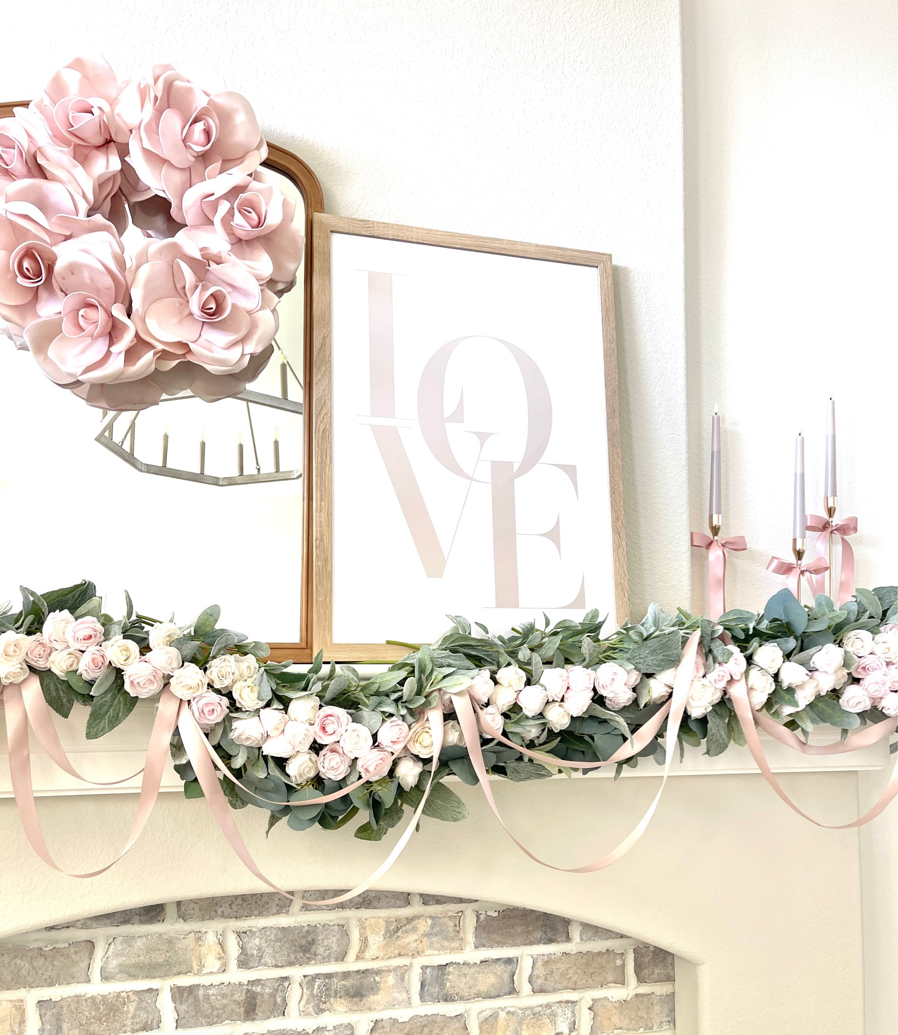  Valentine’s Home Decor 
Mantle Decor 
Rose Garland 
Love wall art 
Wood trim mirror 
Lambs ear garland 
Battery candle sticks 
Ribbon bows 


#LTKSeasonal #LTKstyletip #LTKhome