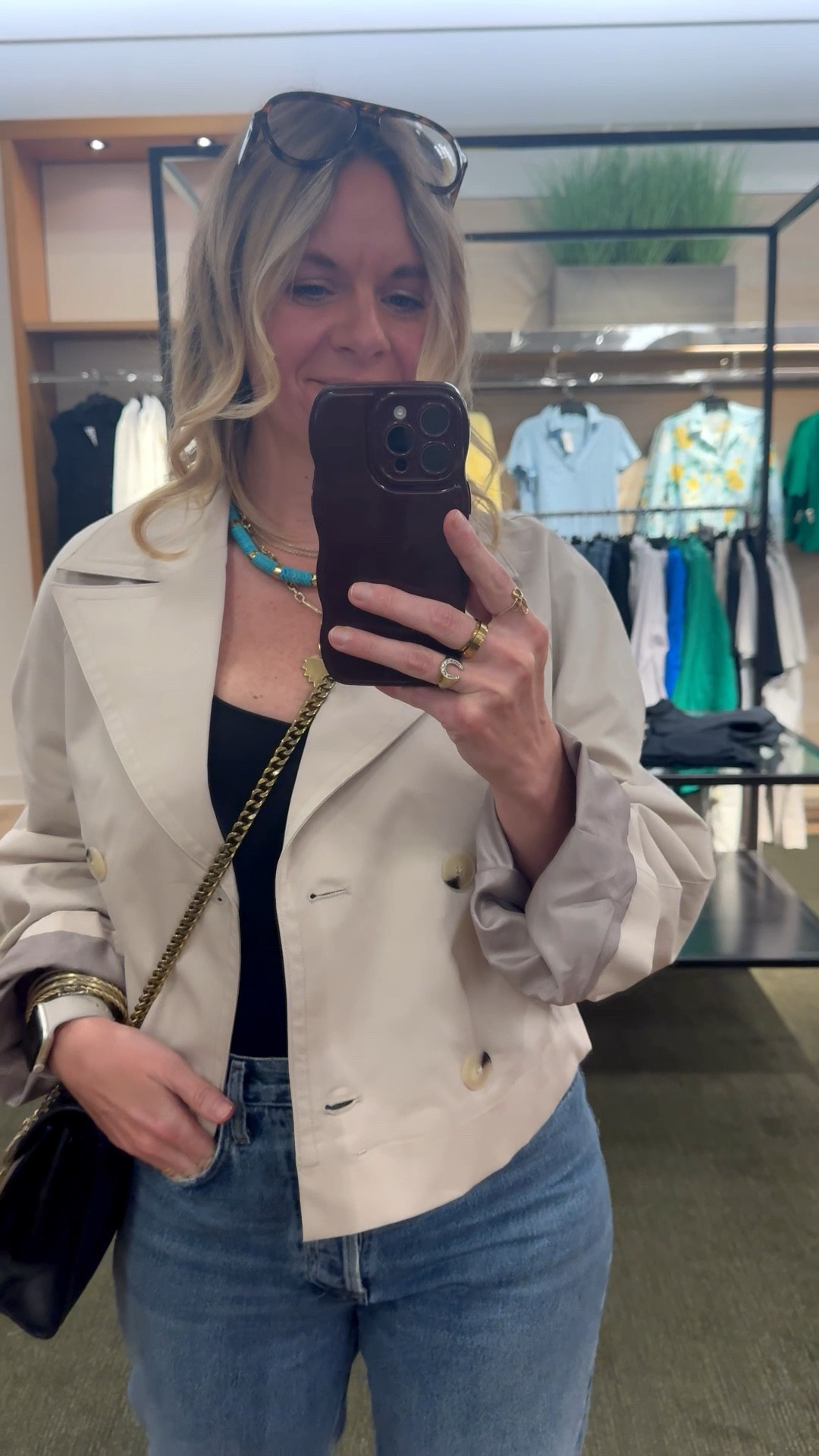 Here are 3 reasons a cropped trench is the most versatile layering piece you're not wearing enough 👇

📍It works over everything without adding bulk. Unlike a blazer or oversized jacket, a cropped trench sits at just the right length to layer over a bodysuit, tee, or blouse without overwhelming your frame or hiding your waist.

📍It instantly elevates basics. Jeans and a bodysuit are as simple as it gets — but throw a cropped trench on top and the whole outfit looks intentional and put together. It's the easiest way to make a casual outfit feel polished.

📍It transitions effortlessly across seasons. Light enough for spring and fall, structured enough to layer in winter, and perfect for over-air-conditioned summers. It's genuinely a year-round piece.

OOTD while pulling for a client appointment ✨ Cropped trench + black bodysuit + straight leg denim + black kitten heel mules + turquoise and gold jewelry. All from my own closet — linked the closest versions I could find so you can shop the look. Everything shoppable below! 👇

#LTKootd #LTKOver40 #LTKdayinmylife