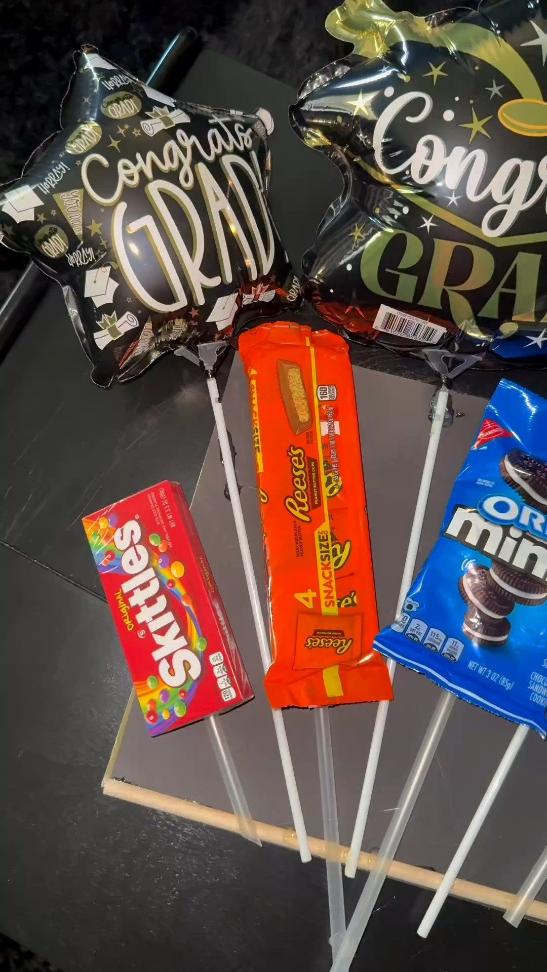 POV: making a graduation bouquet for a senior boy 🎓💙  
Here’s a little step-by-step process of me putting together my nephew’s graduation bouquet featuring some of his favorite snacks, gift cards, and all the little things a graduating senior would love. Definitely a creative way to celebrate your favorite graduate! 🎉✨ #GraduationBouquet #GraduationGiftIdeas #ClassOf2026 #DIYGiftIdeas #SeniorGraduation #GraduationSeason #GiftBouquet #BoyGraduationIdeas #GradGiftInspo

#LTKmomlife #LTKSeasonal