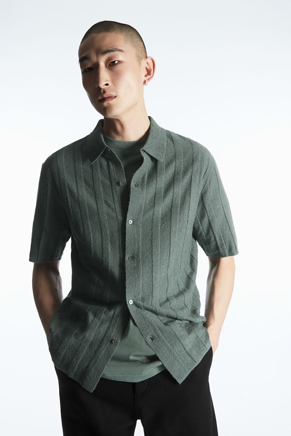 TEXTURED STRIPED KNITTED SHIRT
                        
						$99
	                           		
... | COS (US)