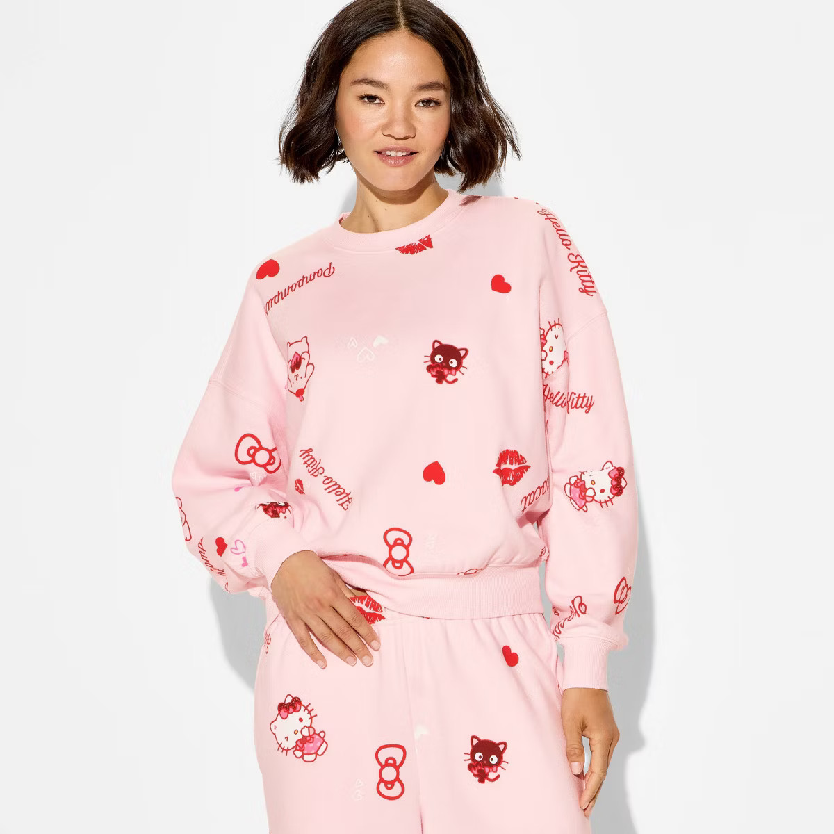 Women's Hello Kitty Fleece Graphic Pullover Sweatshirt - Light Pink | Target