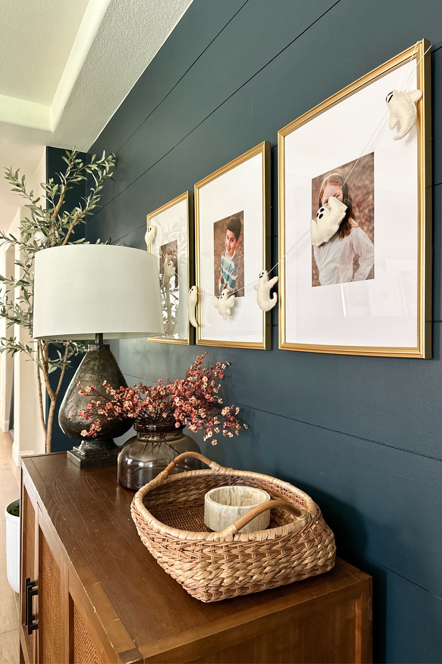 Fall entryway styling

Halloween decor. Felt ghost garland. Faux fall florals. Woven tray. Dark table lamp. Medium tone wood cabinet.

#LTKHome #LTKSaleAlert #LTKSeasonal