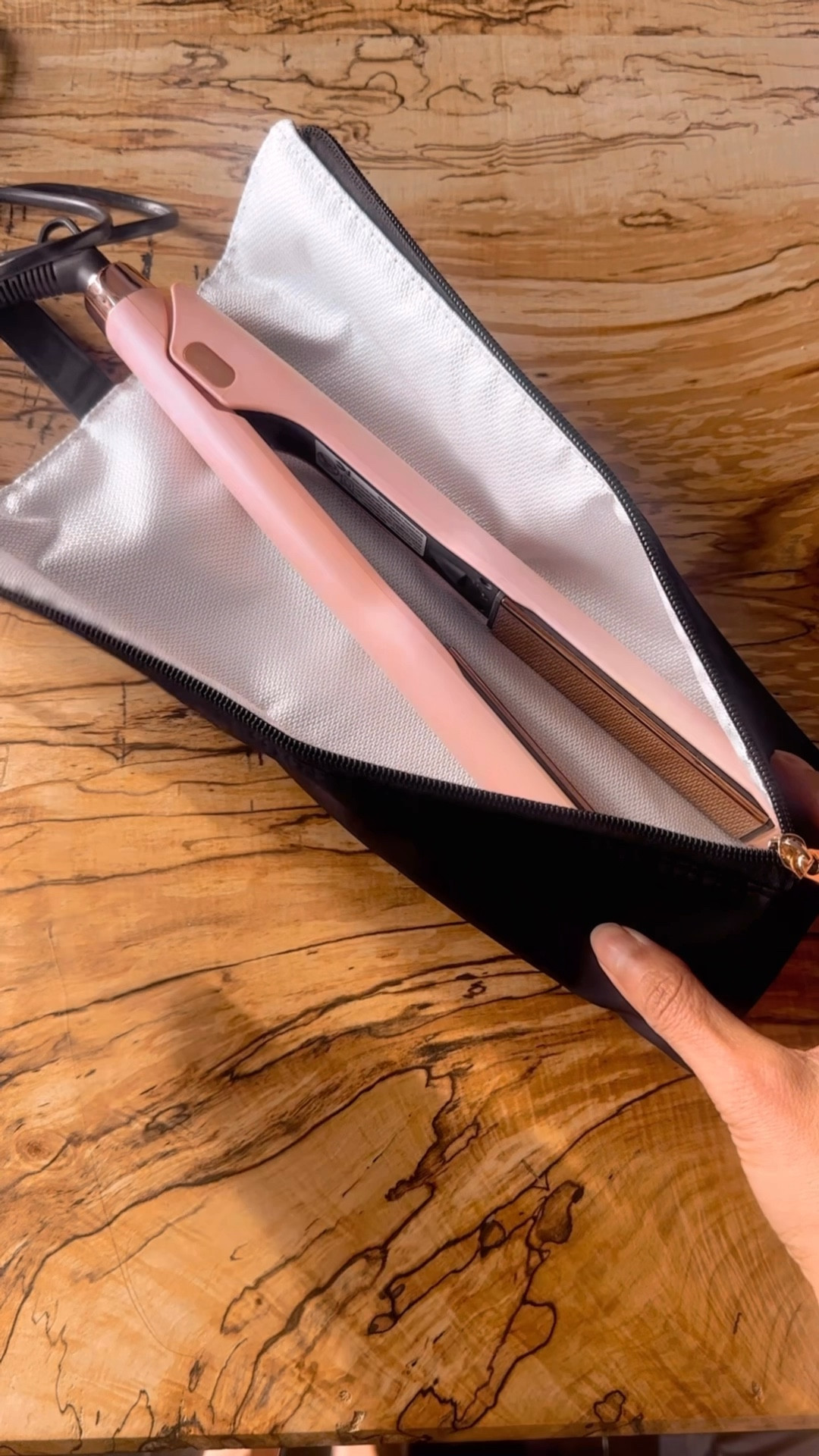 This pouch to hold your hot tools while still cooling down is everything!!!! We’ve recently started traveling more & it’s been a packing game changer, making it so easy to pack my hot flat iron in last minute & not worry about anything in bag getting damaged. 

#LTKBeauty #LTKFindsUnder50 #LTKTravel