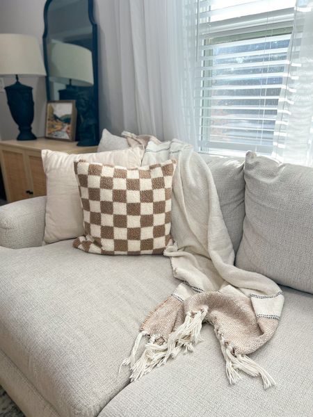 Trendy checker pattern plaid pillow covers. Boucle on front and felt on back only 2/$24! Highly recommend. 

#LTKunder50 #LTKFind #LTKhome