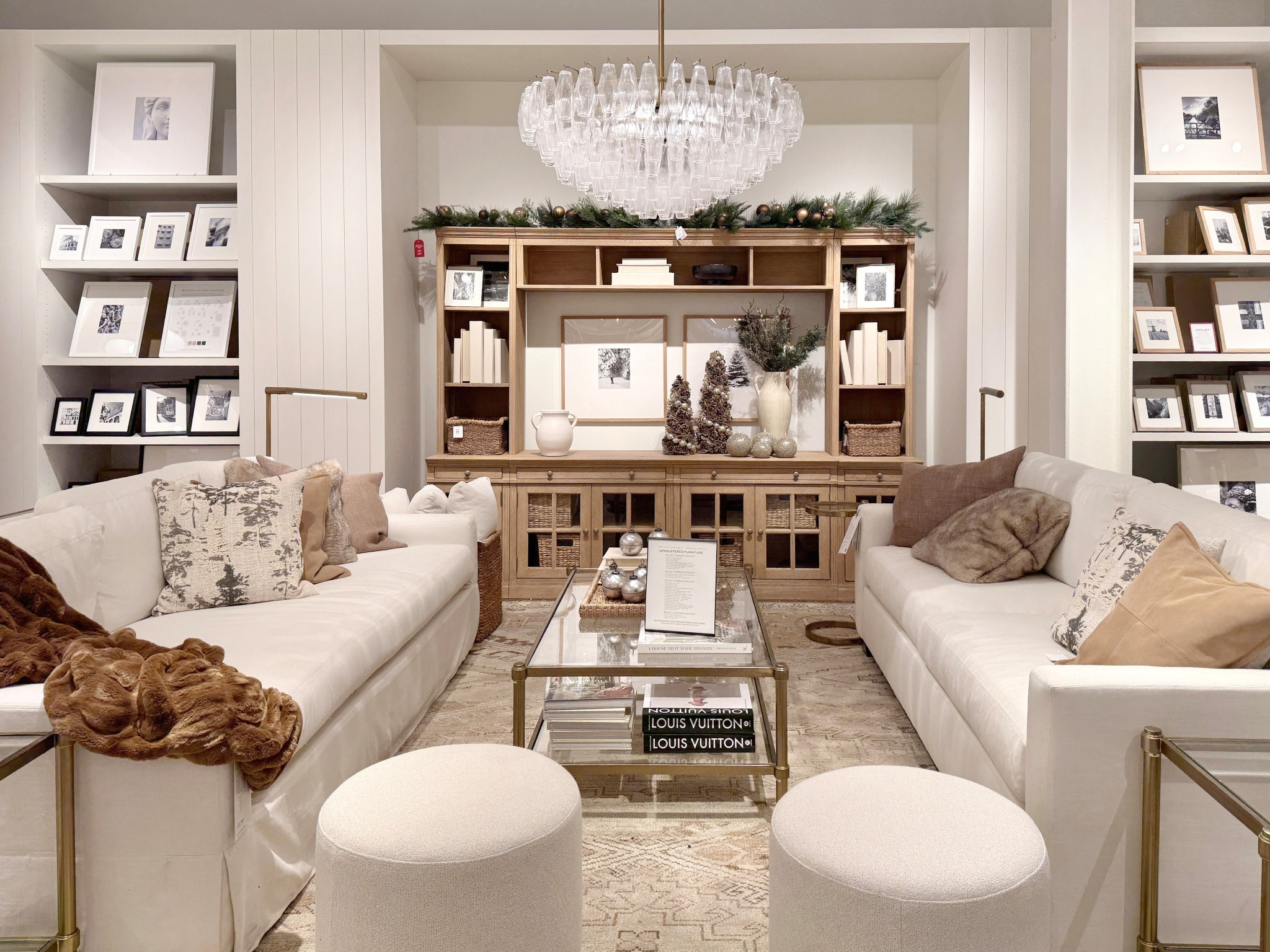 Such a thoughtfully layered living room!🤍 I love how this space feels warm and inviting with two sofas facing each other, creating the perfect setup for conversation and everyday lounging. ☺️The brass-accent side tables add just the right touch of warmth, while the patterned area rug grounds the room and brings in subtle interest. 🤎 Layered textures throughout keep it cozy and lived-in, and the Livingston Entertainment Center from Pottery Barn ties everything together as a beautiful, functional focal point! 😍 A great example of how neutrals, texture, and thoughtful layout can make a living room feel both elevated and comfortable. ✨ #livingroominspo #potterybarn #homedecor

#LTKSaleAlert #LTKHome