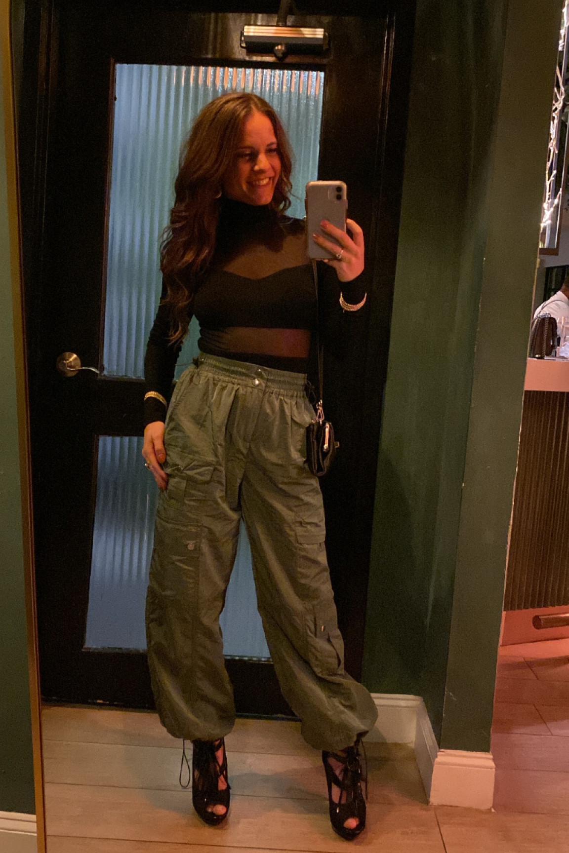 feeling spicy for girls night! Perfect blend of sexy & comfy! Outfit got so many compliments! Parachute pants are def IN! 
Im 5’2” and the pants fit perfectly in my opinion. Size small for both pants & top! 

#LTKstyletip #LTKtravel #LTKfindsunder100