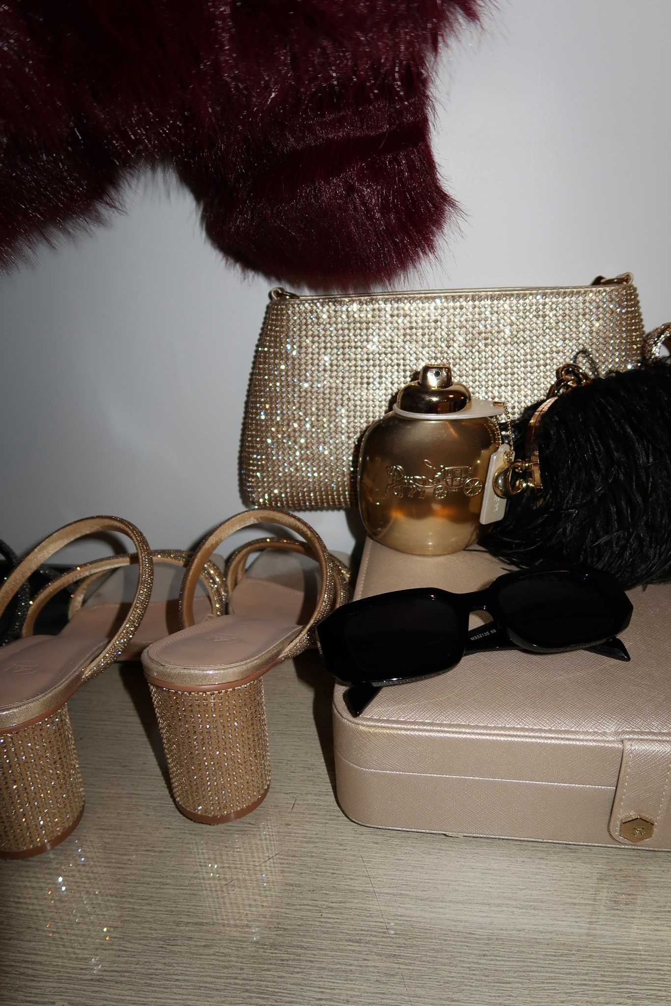 Furs, gold + sequins ✨ Holiday accessories to complete the outfit. Picked up this @coach fragrance for this trip and it is a 10/10. Amazon heels, handbags + sunglasses 

#LTKHoliday #LTKBeauty #LTKootd
