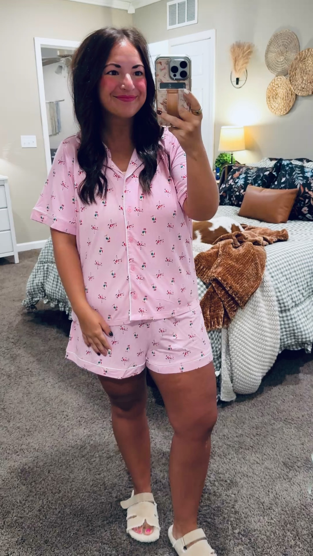Pink pajamas + the cutest little holiday print! 🩷 This festive shorts set is perfect for cozy nights & Christmas movie marathons. Grab yours early—I have a feeling these will sell out before the holidays! 🎄

slippers: sold out, but linking similar options below!
pajama set: fits true to size // wearing a large 

 