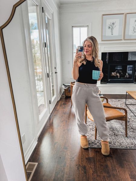 A tank and pair of sweatpants is my favorite outfit to lounge in at home! Put on a cardigan or hoodie and you’re ready to hit the town 🤍
M in top and bottoms 

#LTKfindsunder100 #LTKfitness #LTKfindsunder50