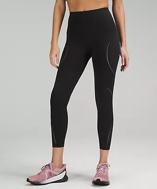 Base Pace High-Rise Reflective Tight 25" | Women's Leggings/Tights | lululemon | Lululemon (US)